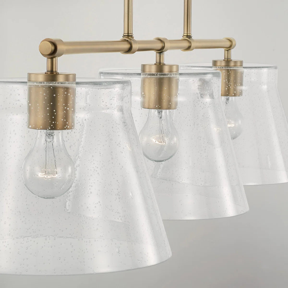 Eska Industrielle 3-flammige Pendelleuchte aus gesätem Glas, dimmbar (2).webp__PID:674d400d-91fc-4234-8ff6-3415c272f113