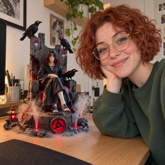 Person with Uchiha humidifier on a desk