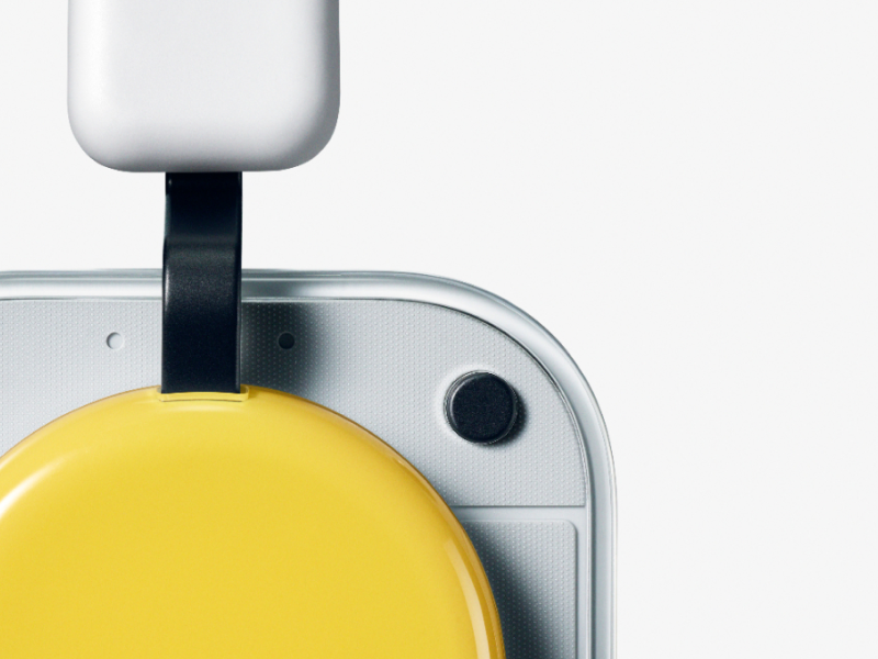 3-in-1 tactile control interface showing button roller and paddle on headphone