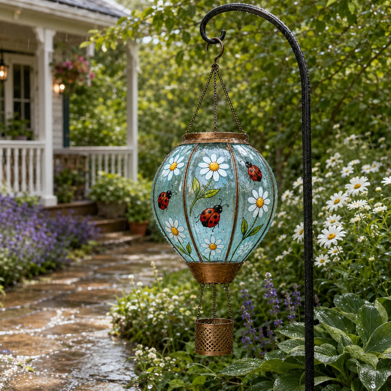 Ladybug solar garden lantern decorating a flower garden pathway