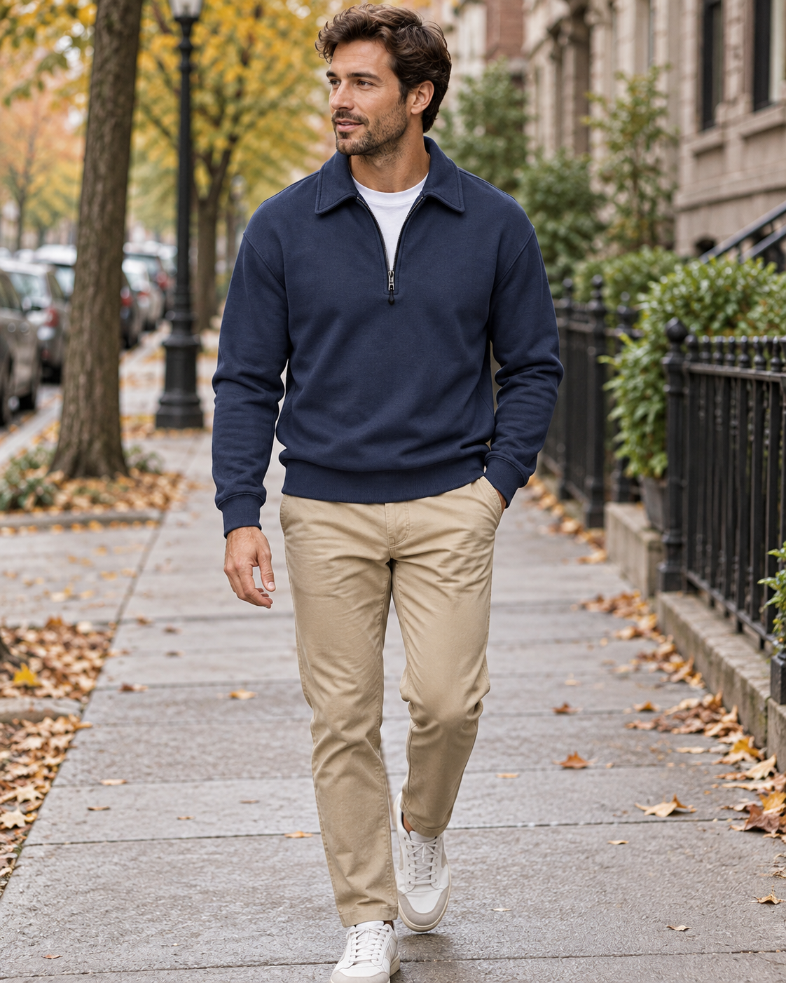 Navy quarter-zip sweatshirt worn on a city walk