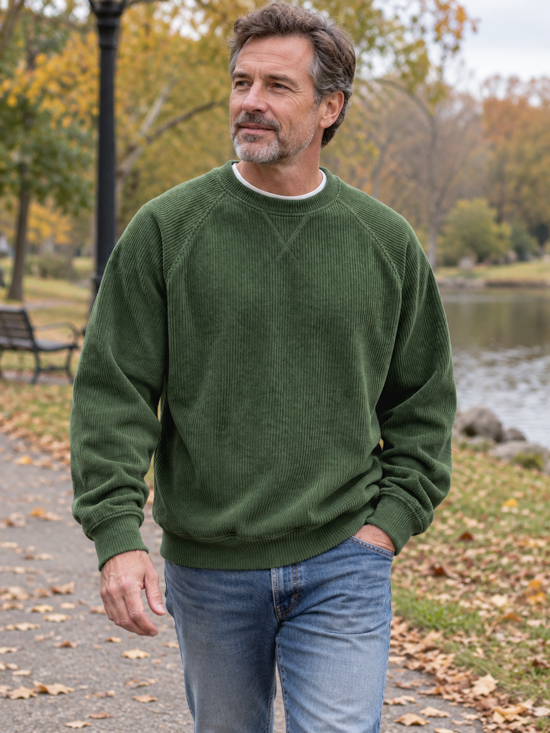 Mature man wearing the army green corduroy crewneck sweatshirt during a park walk