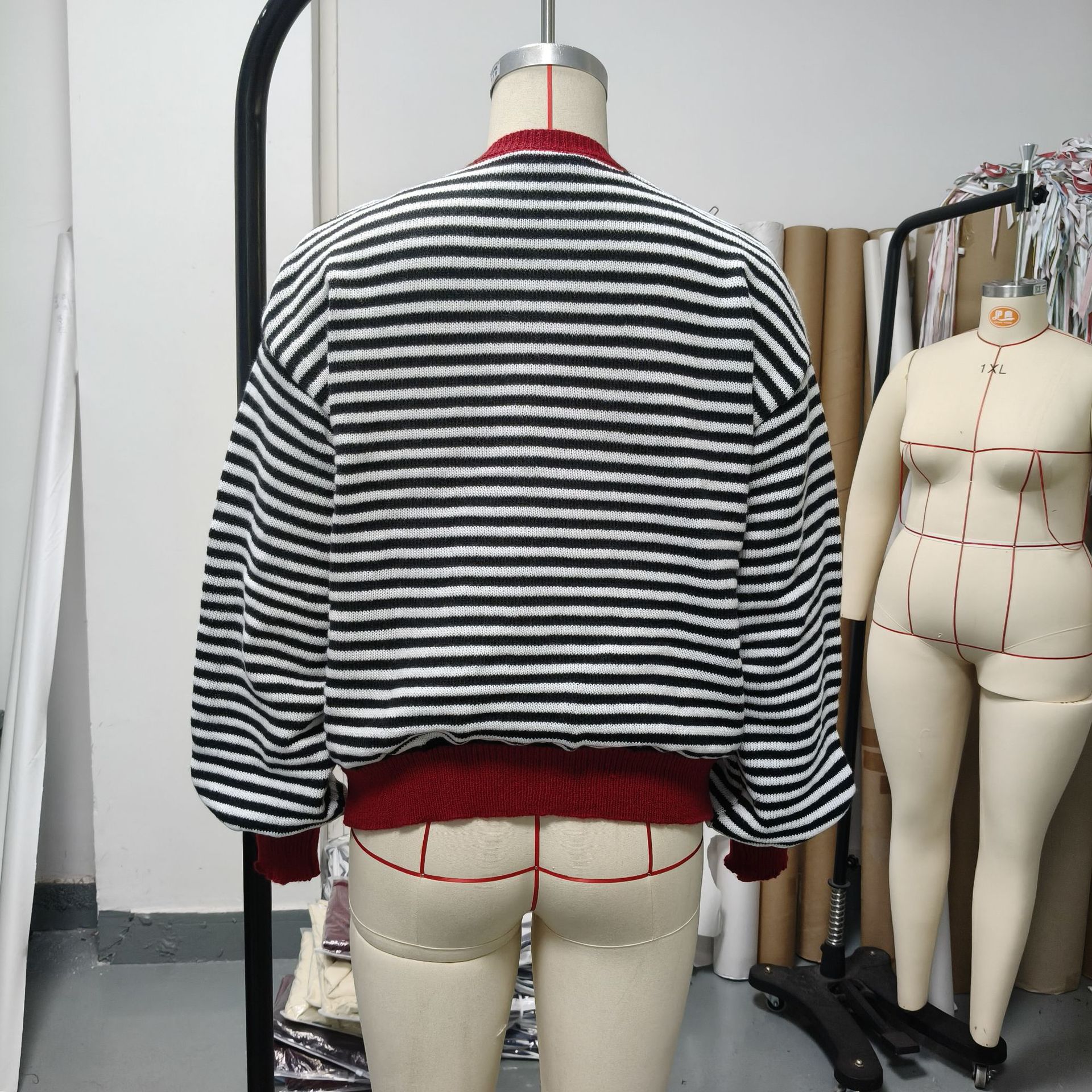 Back view of the striped contrast-trim cardigan