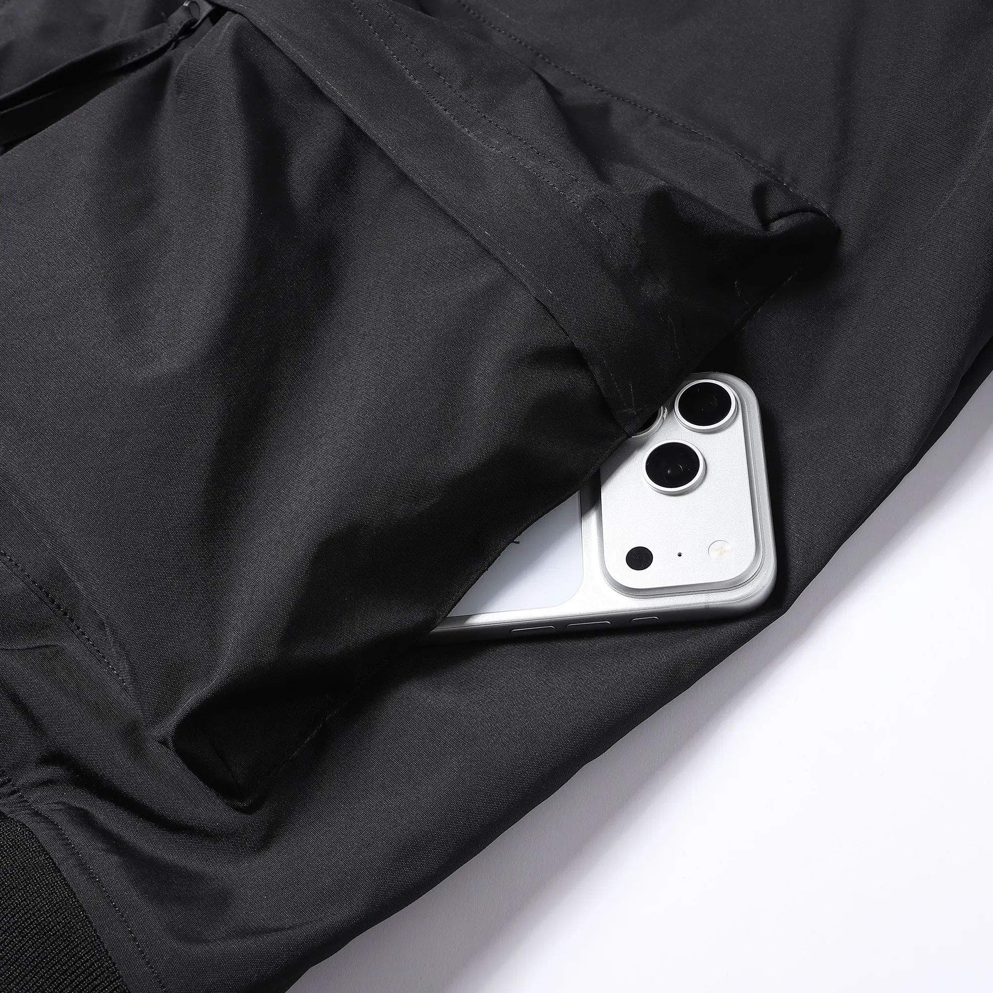 Plus-size men’s workwear jacket featuring a relaxed fit with multiple zippered pockets