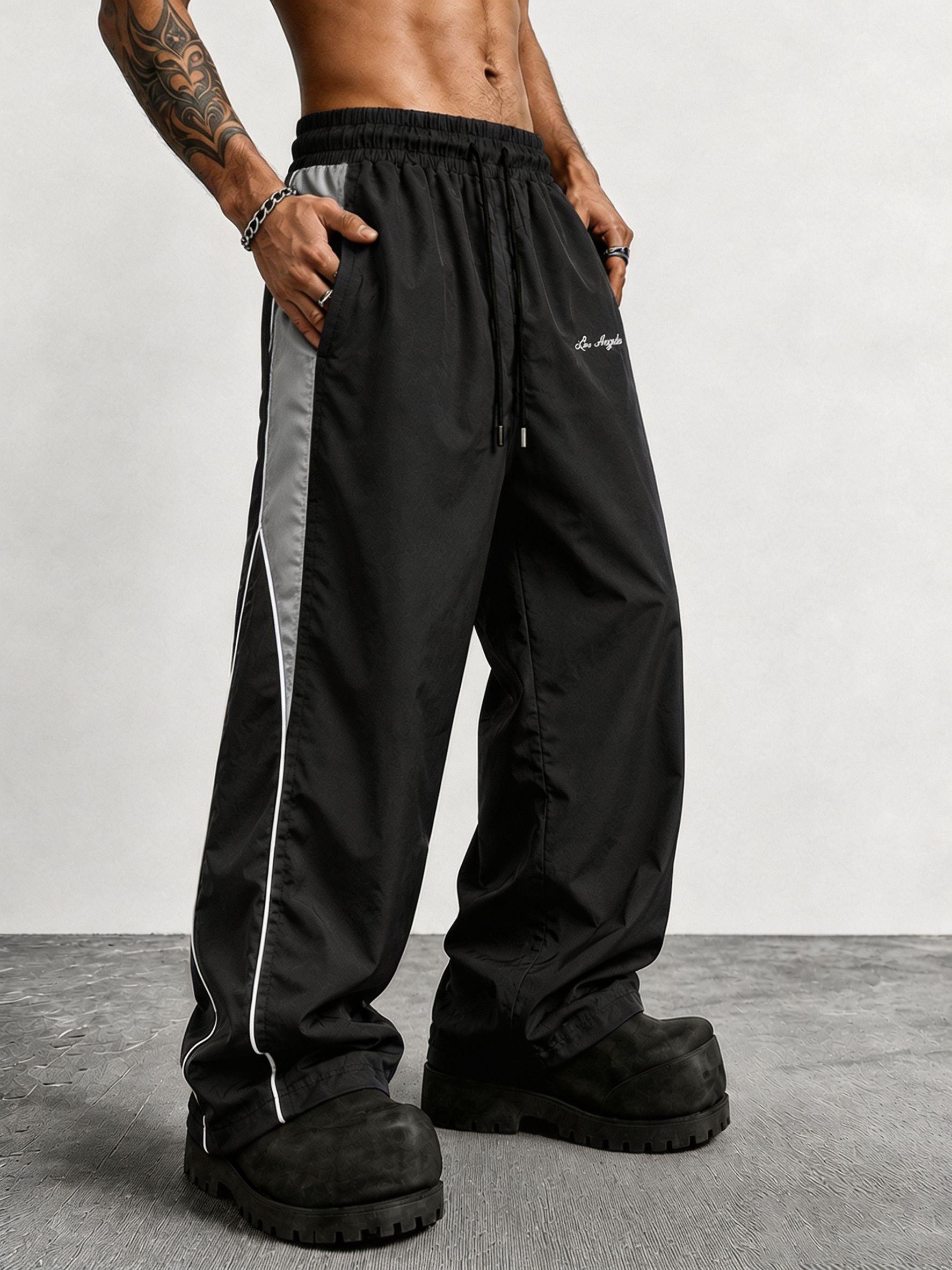 Men's contrasting color reflective strip wide-leg casual pants, pendant smooth fabric, side stripes, American high street style, daily commuting adaptation, trendy and versatile personality