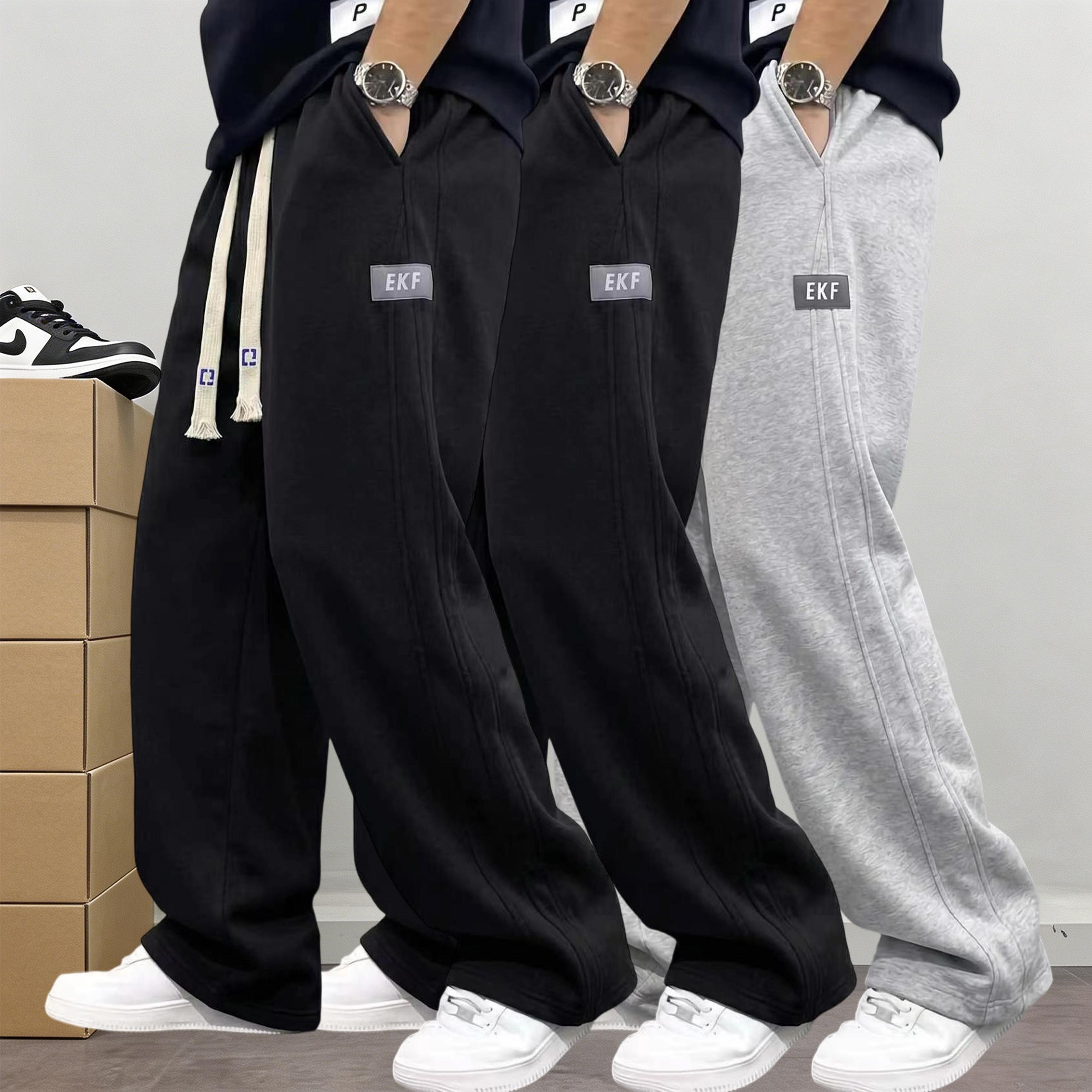 Men&rsquo;s 3-pack cotton joggers with drawstring elastic waist and wide legs; relaxed, drapey straight cut with practical side pockets; American street style; versatile casual pants for everyday commuting, sports, and streetwear.
