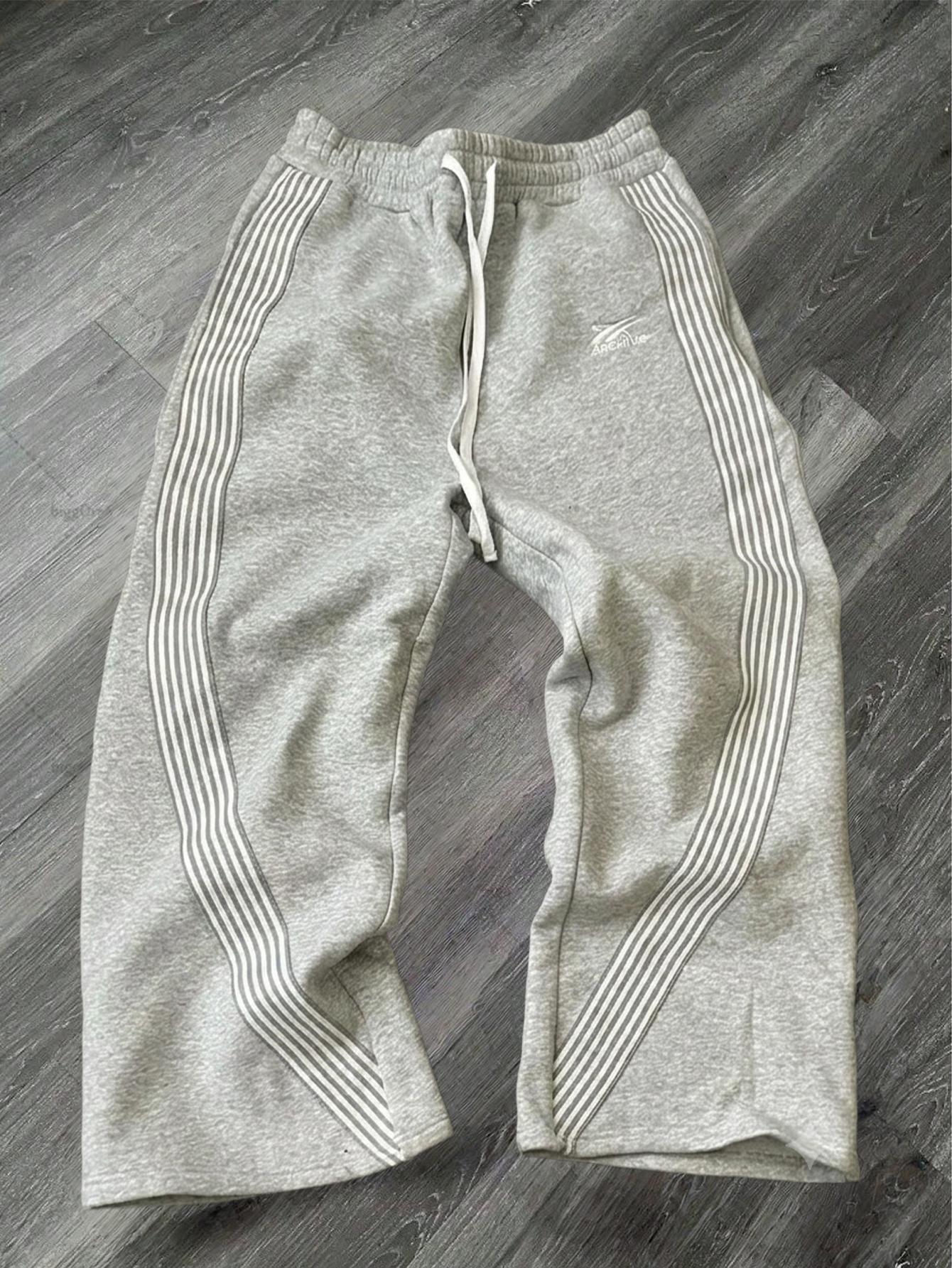 Men’s two-pack athletic sweatpants with side stripes — embroidered drawstring straight-leg long pants; American high-street retro loose casual long pants Men’s two-pack athletic sweatpants with side stripes — embroidered drawstring straight-leg long pants; American high-street retro loose casual long pants