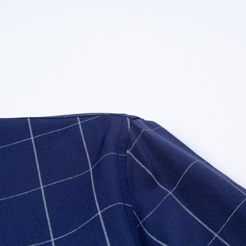 Men&rsquo;s short-sleeve shirt with four panels and color-block contrast collar, urban casual style. Turn-down collar with contrasting plaid lining, orange button front, and a slim fit. Smooth fabric drapes comfortably, with a tailored silhouette that flatters
