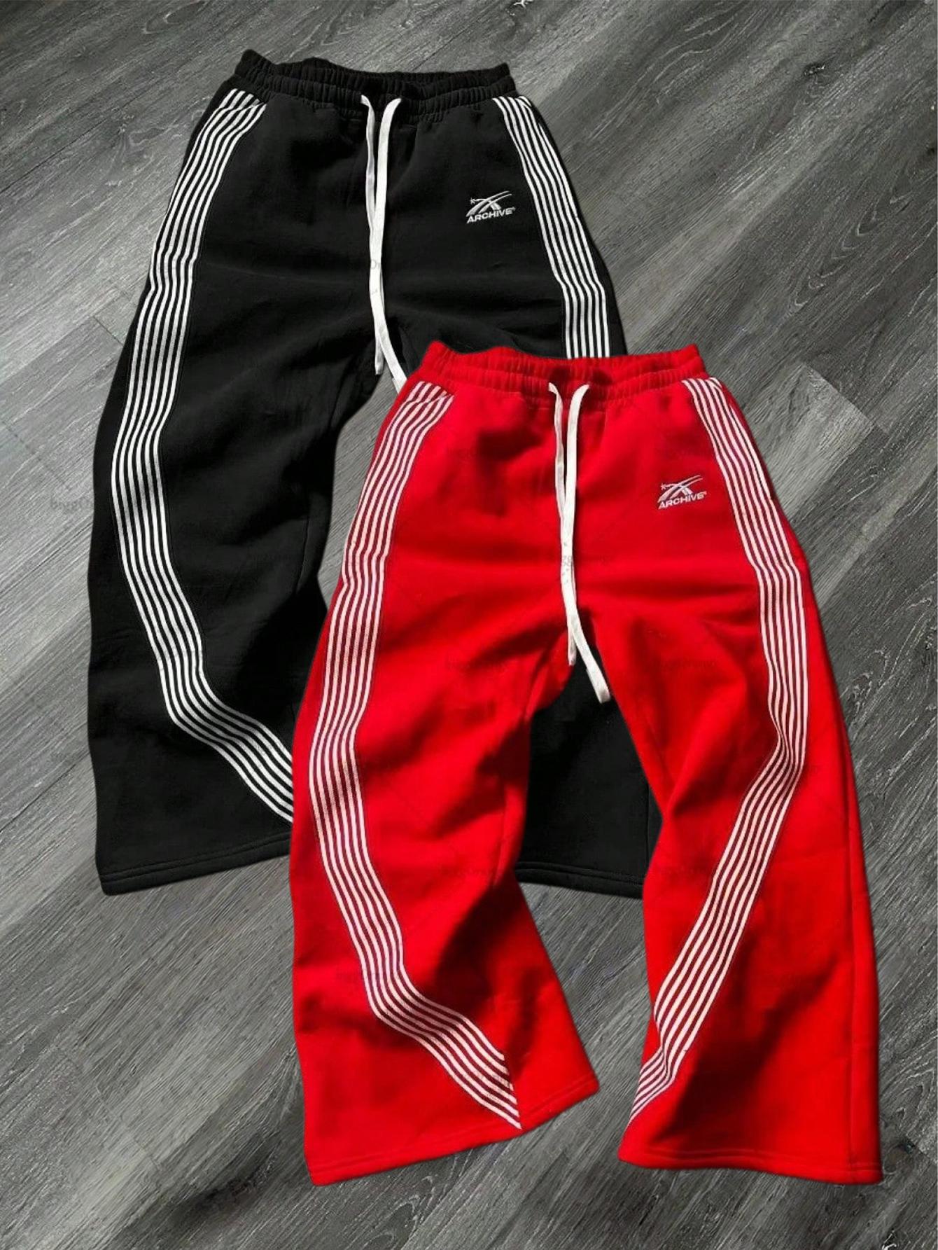 Men’s two-pack athletic sweatpants with side stripes — embroidered drawstring straight-leg long pants; American high-street retro loose casual long pants Men’s two-pack athletic sweatpants with side stripes — embroidered drawstring straight-leg long pants; American high-street retro loose casual long pants