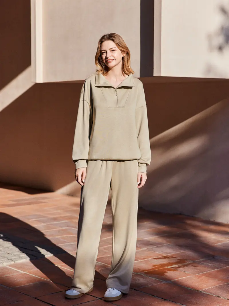 Women's two-piece sportswear set (includes long-sleeve half-zip sweatshirt and athletic pants)