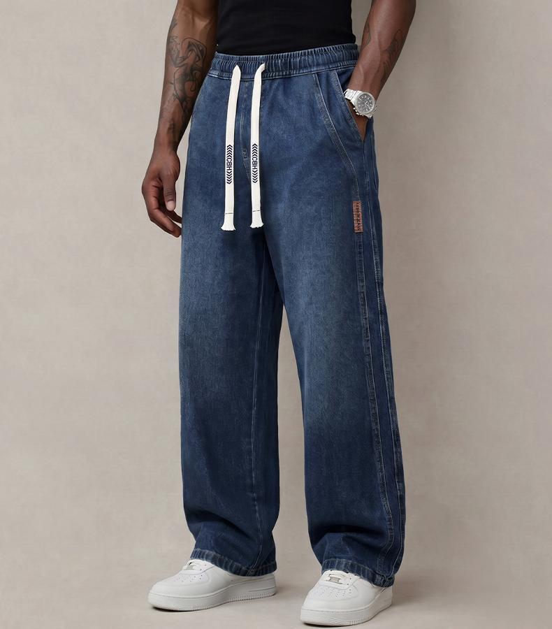 Men&rsquo;s jeans made from stretchy cotton&mdash;comfortable and stylish. Loose fit for everyday wear; long pants with a drawstring elastic waistband design for men.