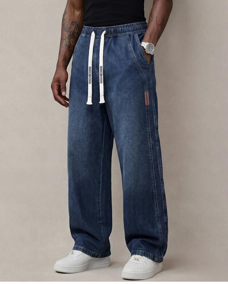 Men&rsquo;s jeans made from stretchy cotton&mdash;comfortable and stylish. Loose fit for everyday wear; long pants with a drawstring elastic waistband design for men.