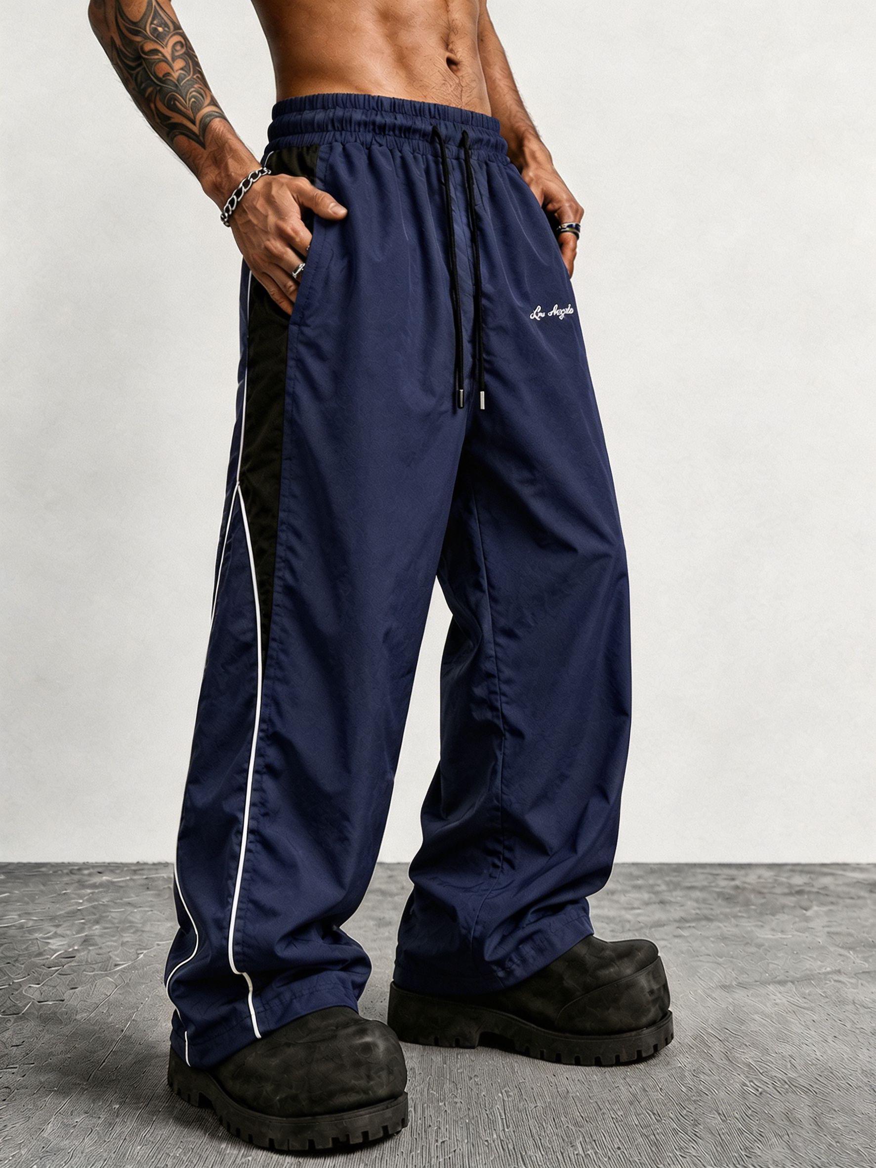 Men's contrasting color reflective strip wide-leg casual pants, pendant smooth fabric, side stripes, American high street style, daily commuting adaptation, trendy and versatile personality