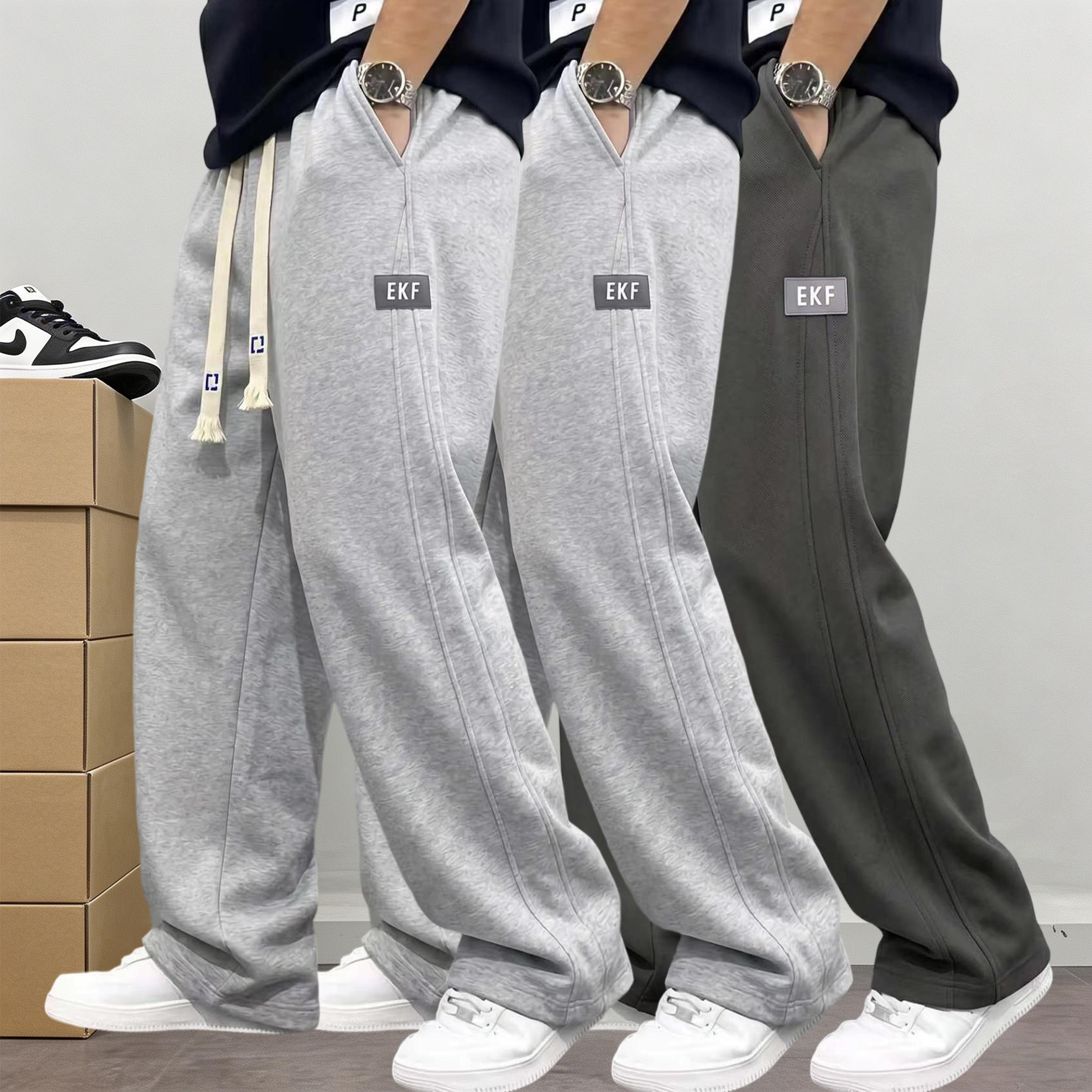 Men&rsquo;s 3-pack cotton joggers with drawstring elastic waist and wide legs; relaxed, drapey straight cut with practical side pockets; American street style; versatile casual pants for everyday commuting, sports, and streetwear.