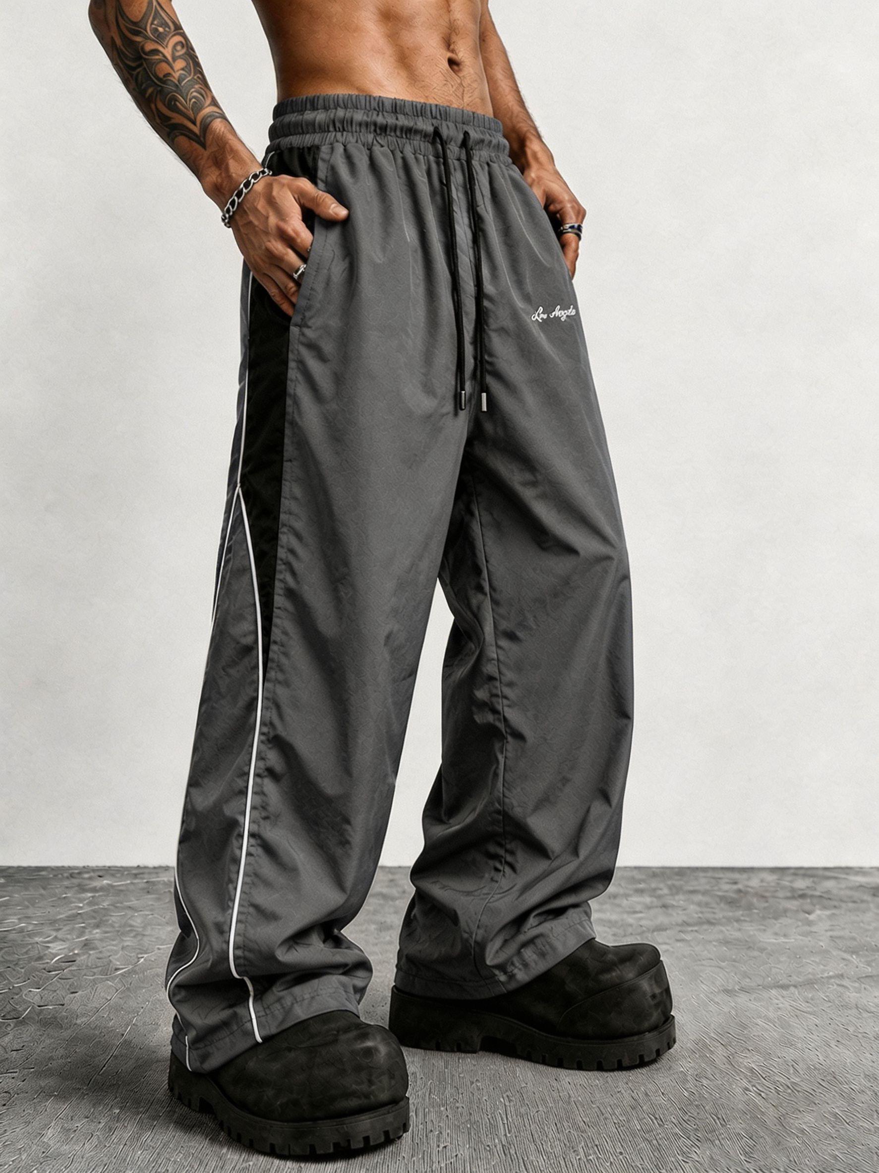Men's contrasting color reflective strip wide-leg casual pants, pendant smooth fabric, side stripes, American high street style, daily commuting adaptation, trendy and versatile personality