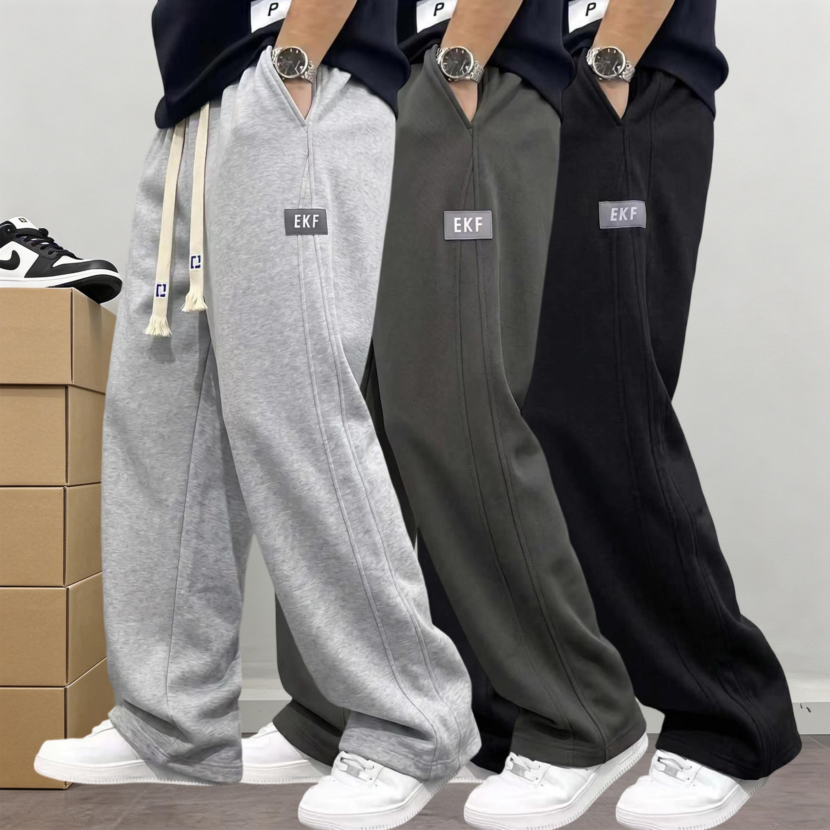 Men&rsquo;s 3-pack cotton joggers with drawstring elastic waist and wide legs; relaxed, drapey straight cut with practical side pockets; American street style; versatile casual pants for everyday commuting, sports, and streetwear.