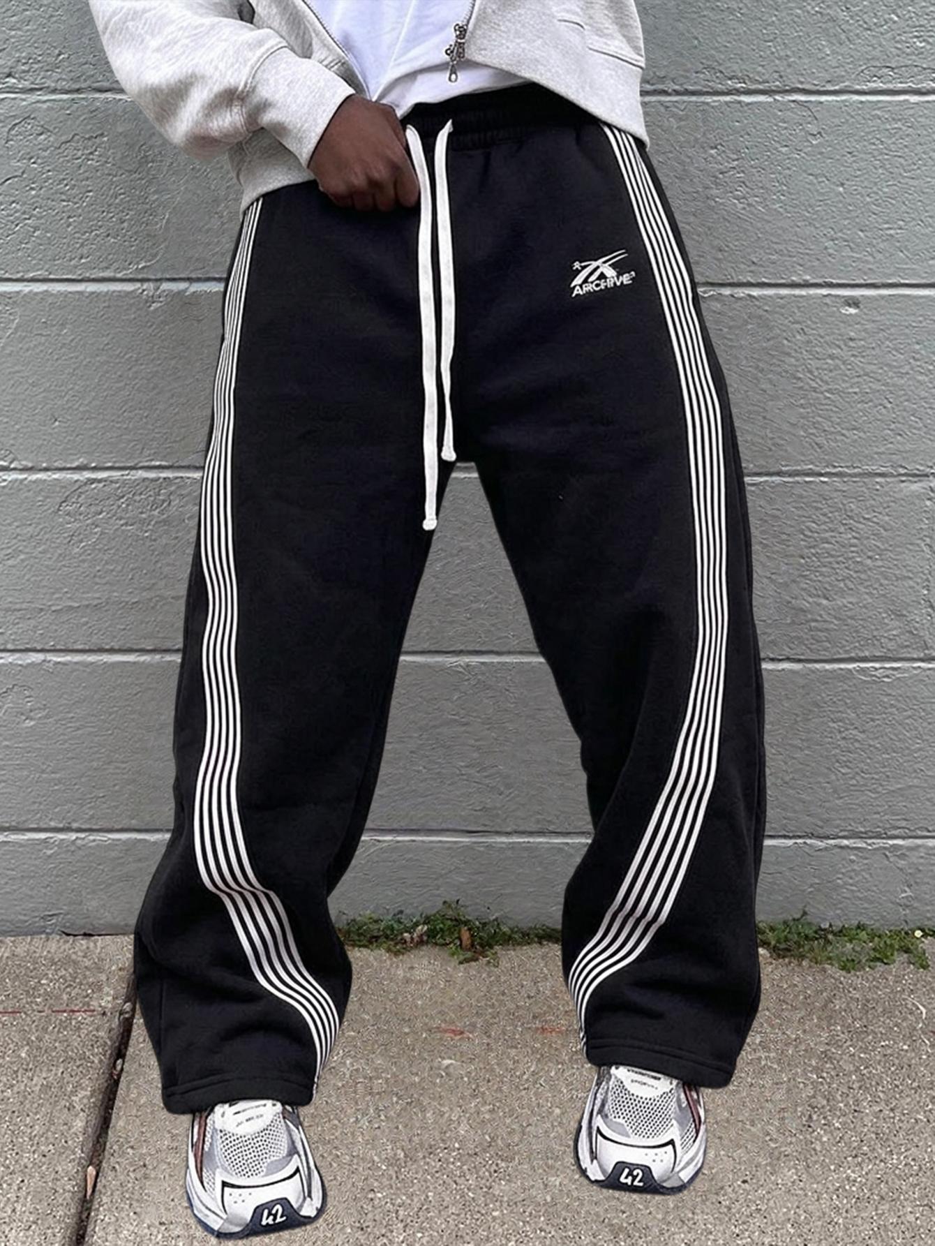 Men’s two-pack athletic sweatpants with side stripes — embroidered drawstring straight-leg long pants; American high-street retro loose casual long pants Men’s two-pack athletic sweatpants with side stripes — embroidered drawstring straight-leg long pants; American high-street retro loose casual long pants