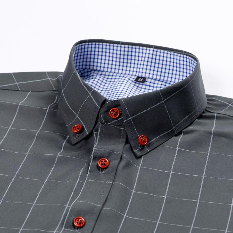 Men&rsquo;s short-sleeve shirt with four panels and color-block contrast collar, urban casual style. Turn-down collar with contrasting plaid lining, orange button front, and a slim fit. Smooth fabric drapes comfortably, with a tailored silhouette that flatters