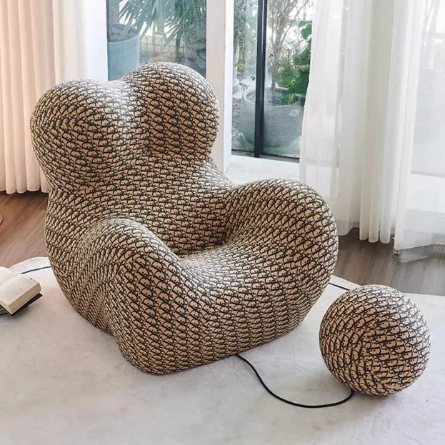 This space‑saving cuddle lounge chair features breathable cool‑touch fabric, supportive padding and stylish modern looks for relaxed home seating.