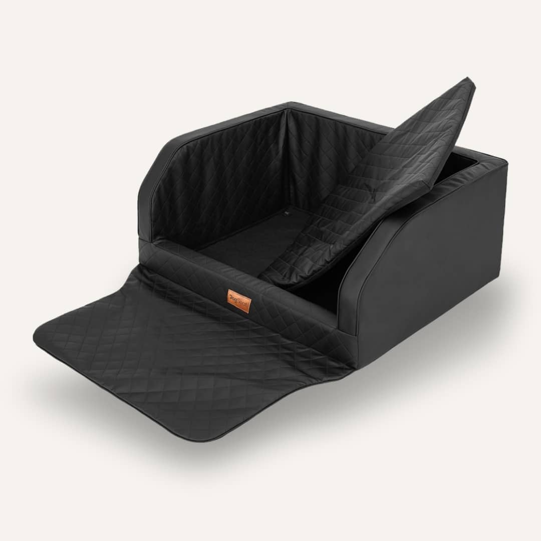 Luxury leather‑look car trunk pet travel basket with protective bumper flap, reinforced safety straps, padded comfort, machine‑washable for 1‑2 dogs.