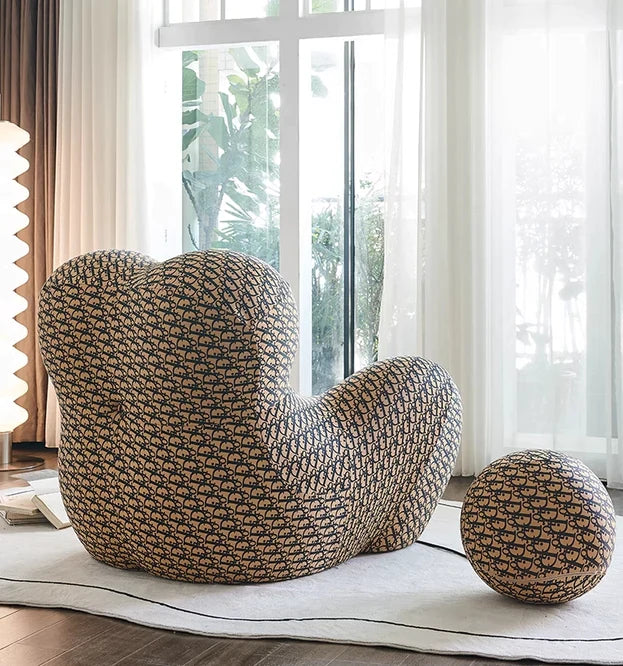This space‑saving cuddle lounge chair features breathable cool‑touch fabric, supportive padding and stylish modern looks for relaxed home seating.