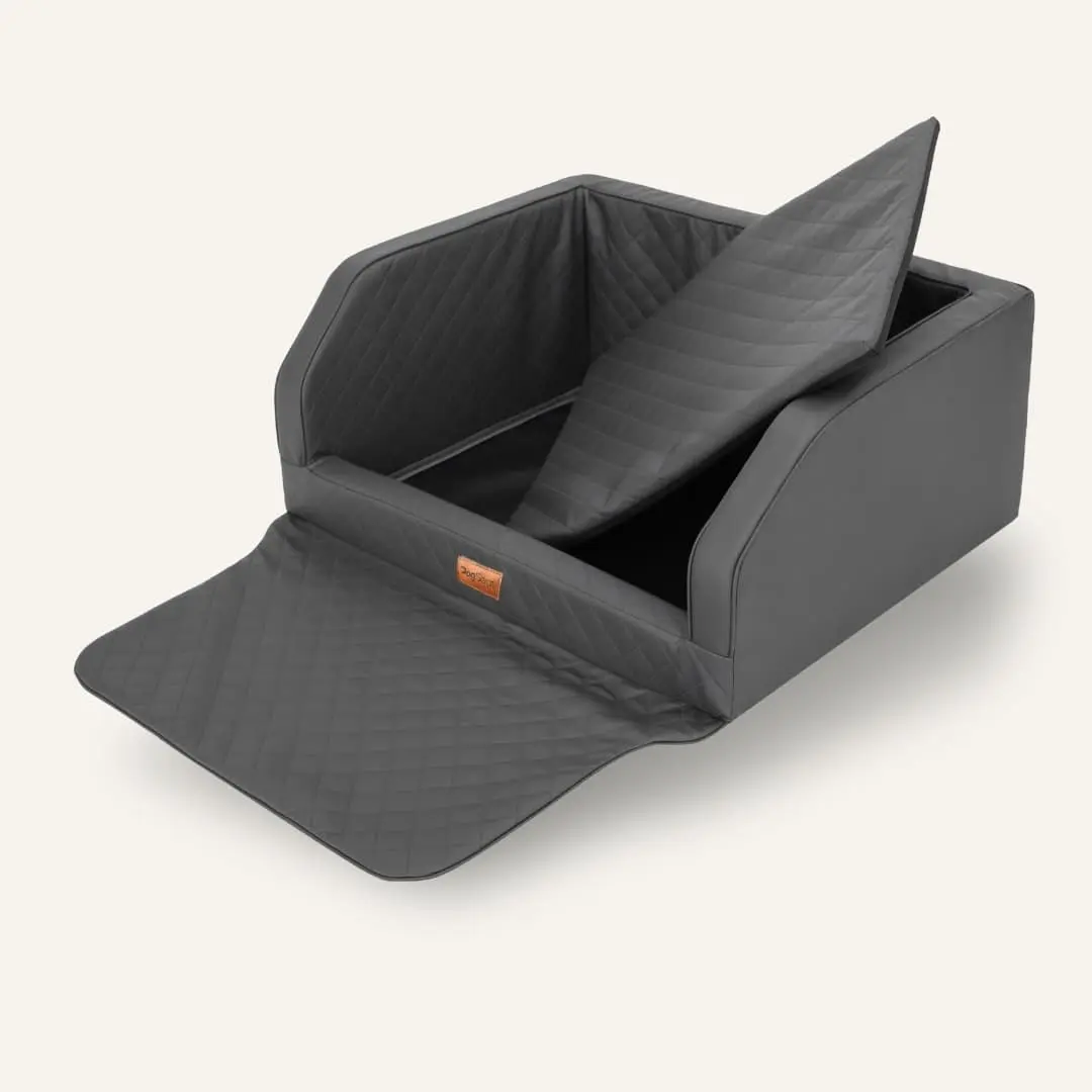 Luxury leather‑look car trunk pet travel basket with protective bumper flap, reinforced safety straps, padded comfort, machine‑washable for 1‑2 dogs.