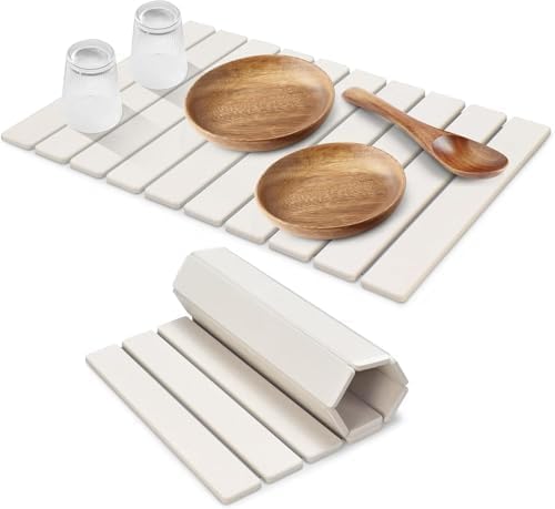 Large foldable diatomaceous‑earth dish drying mat, highly absorbent and quick‑drying, eco‑friendly design for cups, bottles and tableware, suits most kitchen countertops.