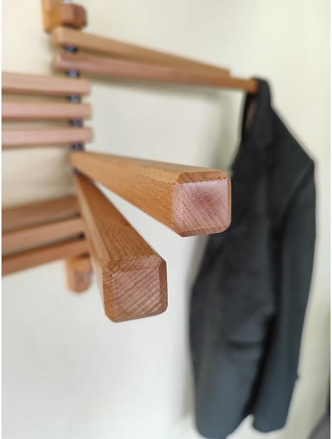 Space-saving wall-mounted wooden drying rack with flexible swivel arms, easy installation and large hanging capacity, perfect for tidy bathrooms and laundry rooms.