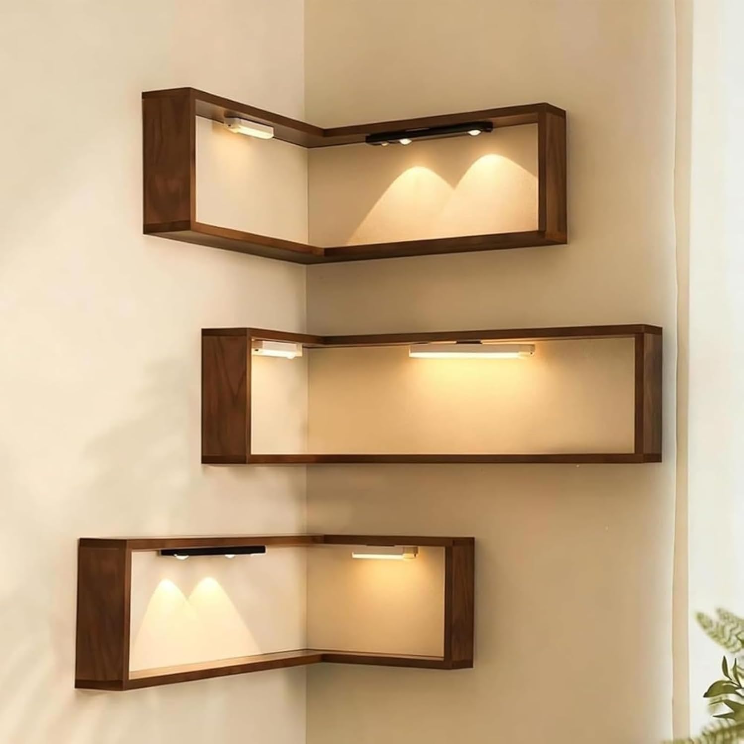 Set‑of‑3 solid‑wood wall‑mounted floating corner shelves, reversible left‑right fit, with rechargeable soft LED lights for stylish home display and storage. 