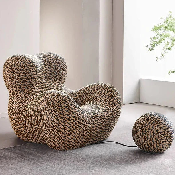 This space‑saving cuddle lounge chair features breathable cool‑touch fabric, supportive padding and stylish modern looks for relaxed home seating.