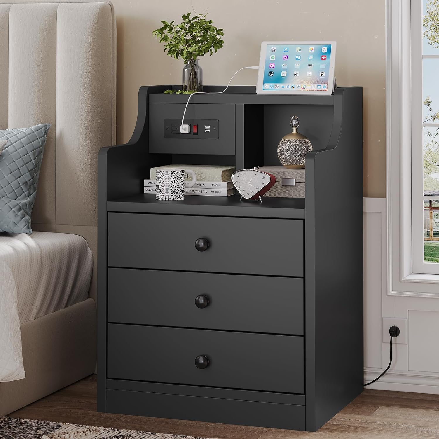 This multi‑drawer bedside cabinet with built‑in USB and mains charging ports is sturdily built, space‑saving and versatile for bedrooms and living‑room spaces.