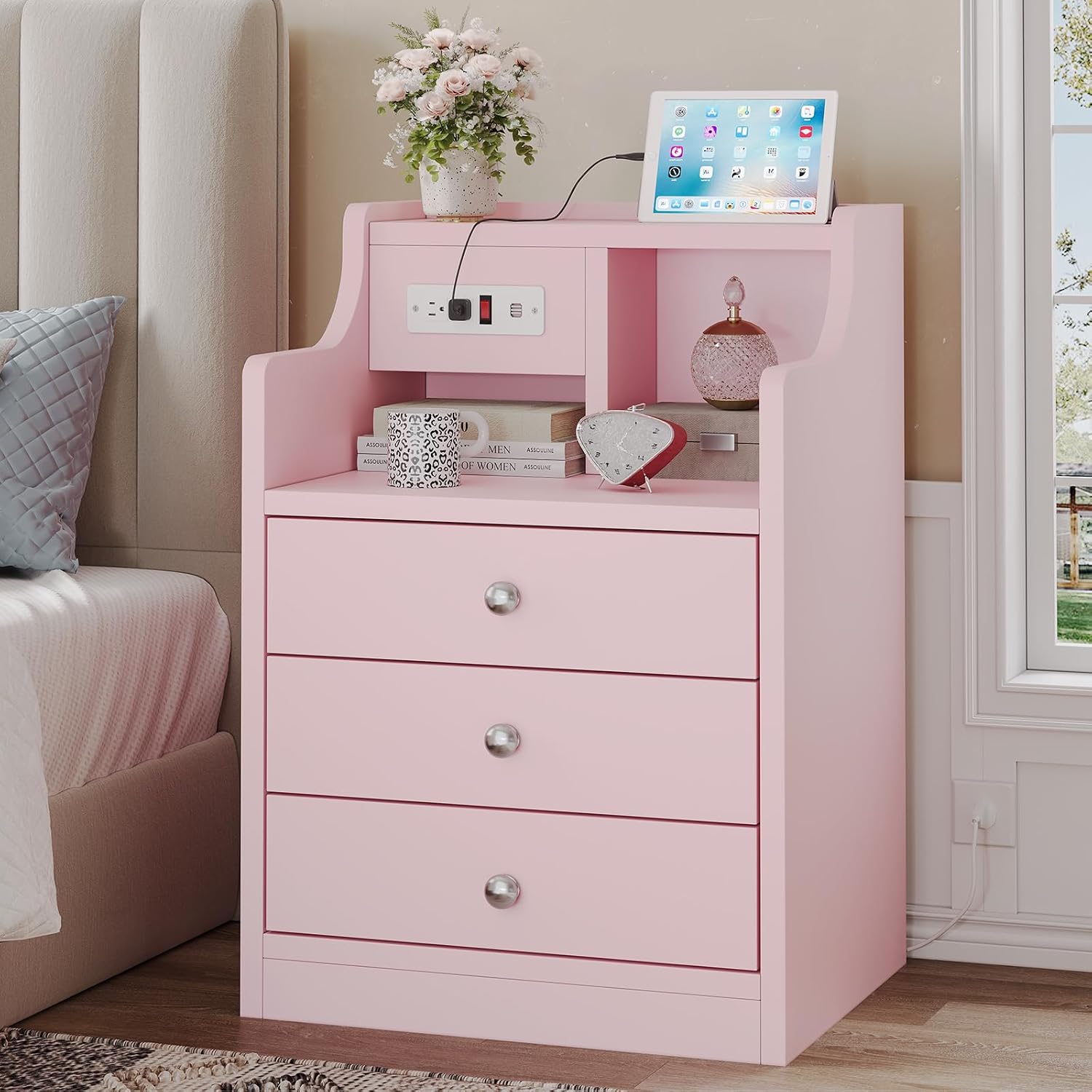 This multi‑drawer bedside cabinet with built‑in USB and mains charging ports is sturdily built, space‑saving and versatile for bedrooms and living‑room spaces.