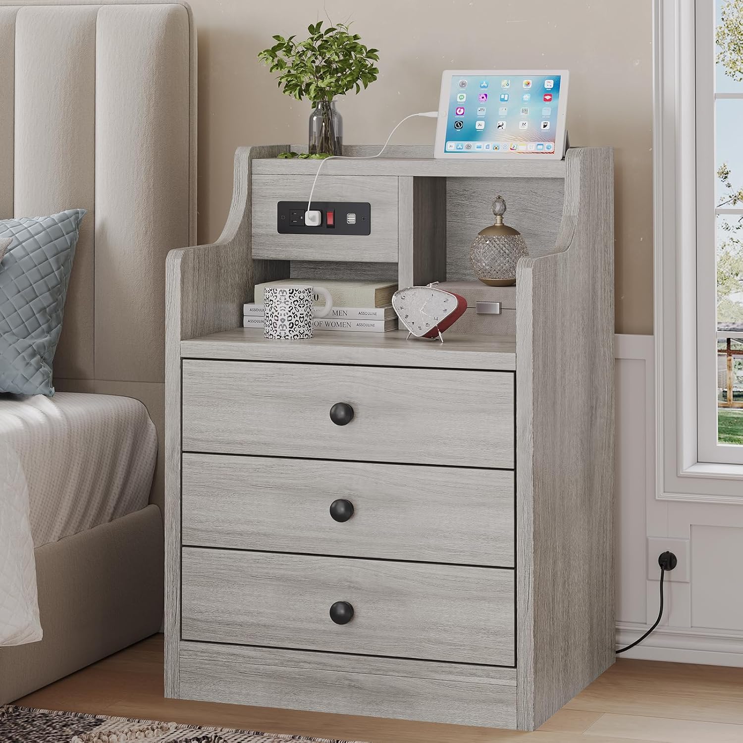 This multi‑drawer bedside cabinet with built‑in USB and mains charging ports is sturdily built, space‑saving and versatile for bedrooms and living‑room spaces.