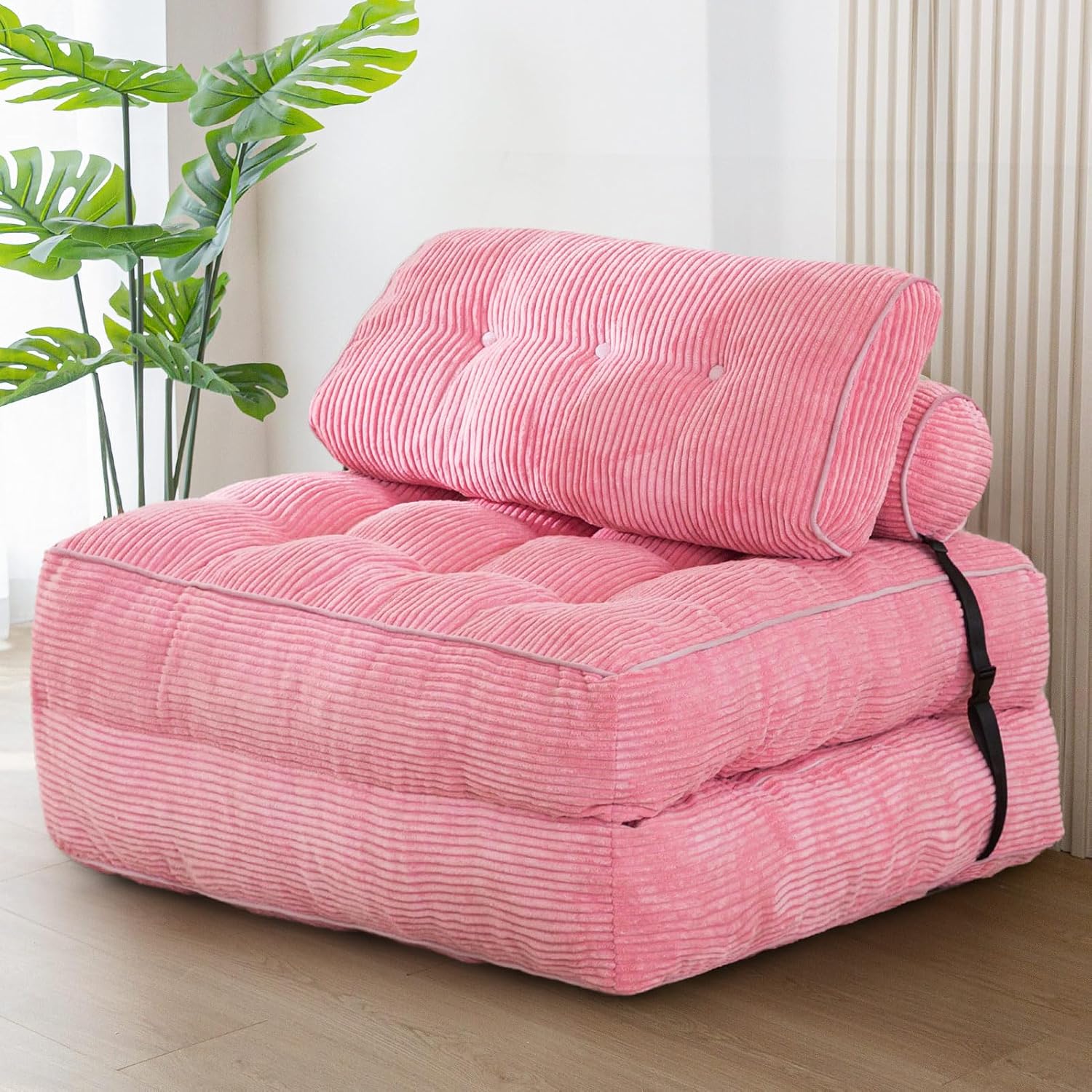 Practical folding sofa‑bed with headrest and lumbar support, comfy foam filling, compact multi‑use furniture for small living spaces and overnight guests.