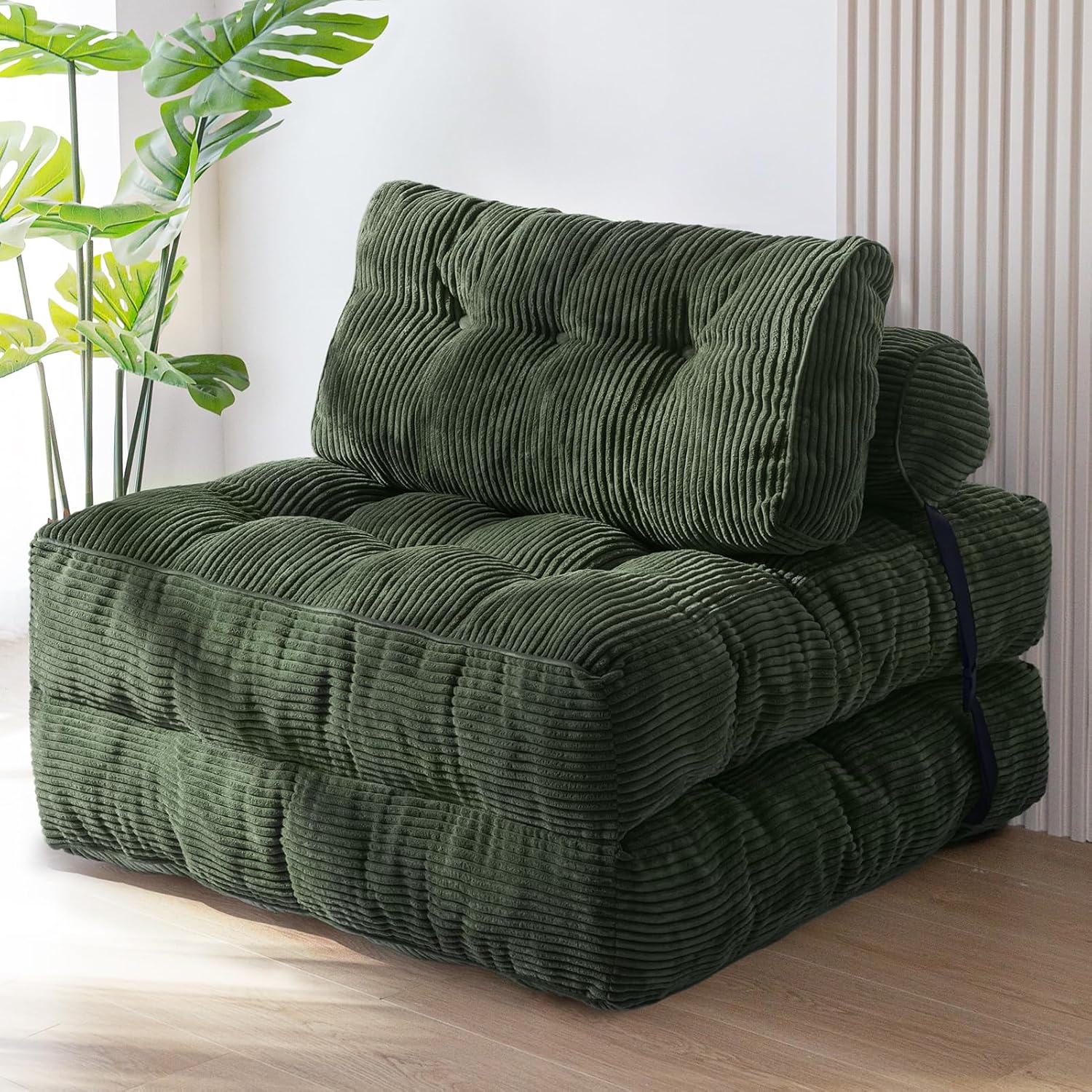 Practical folding sofa‑bed with headrest and lumbar support, comfy foam filling, compact multi‑use furniture for small living spaces and overnight guests.