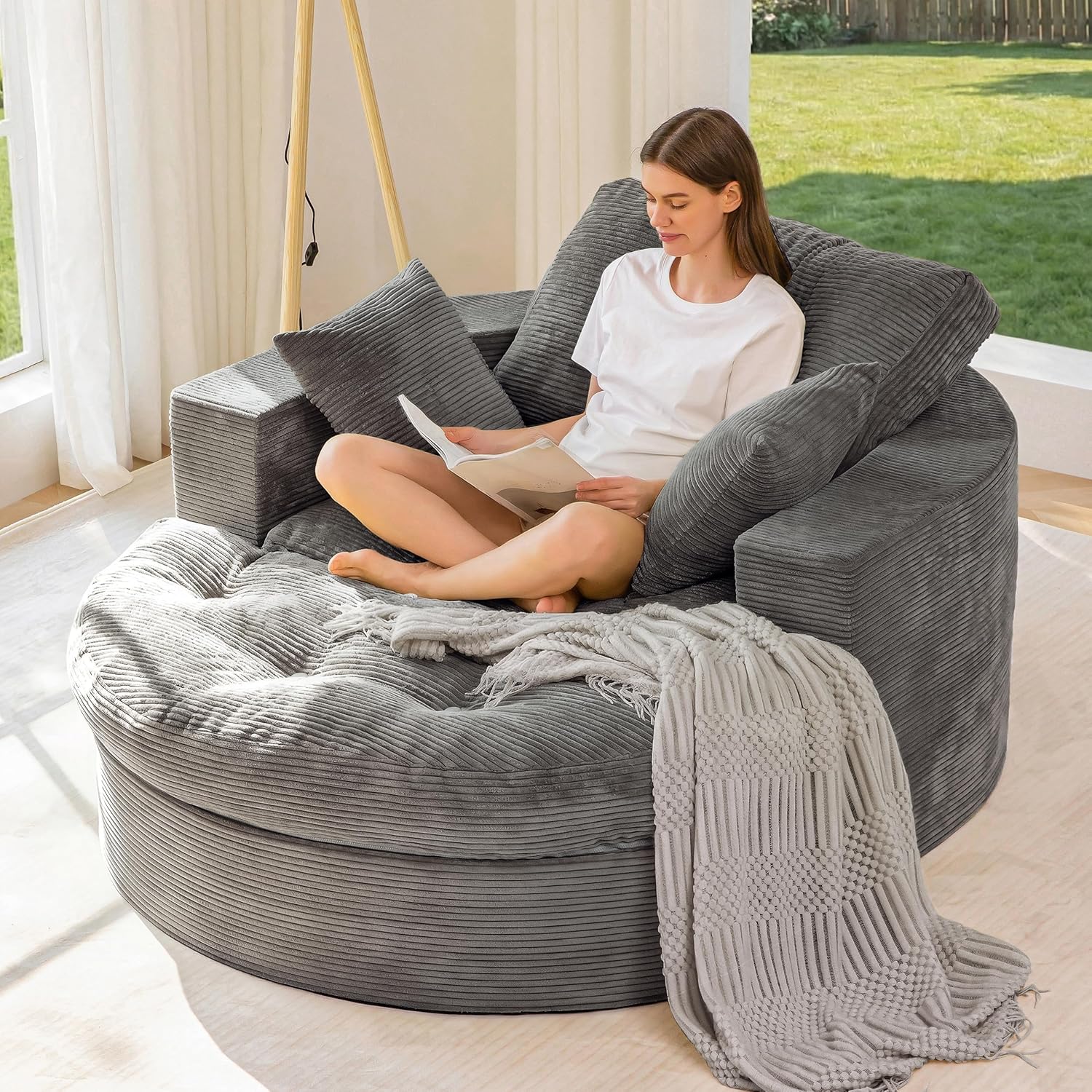 This zip‑detachable oversized lounge sofa features dual‑layer foam cushioning, soft textured fabric and needs no assembly for flexible home seating.