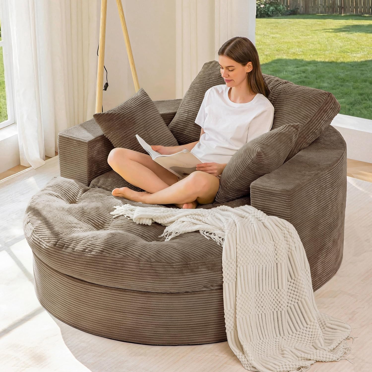 This zip‑detachable oversized lounge sofa features dual‑layer foam cushioning, soft textured fabric and needs no assembly for flexible home seating.
