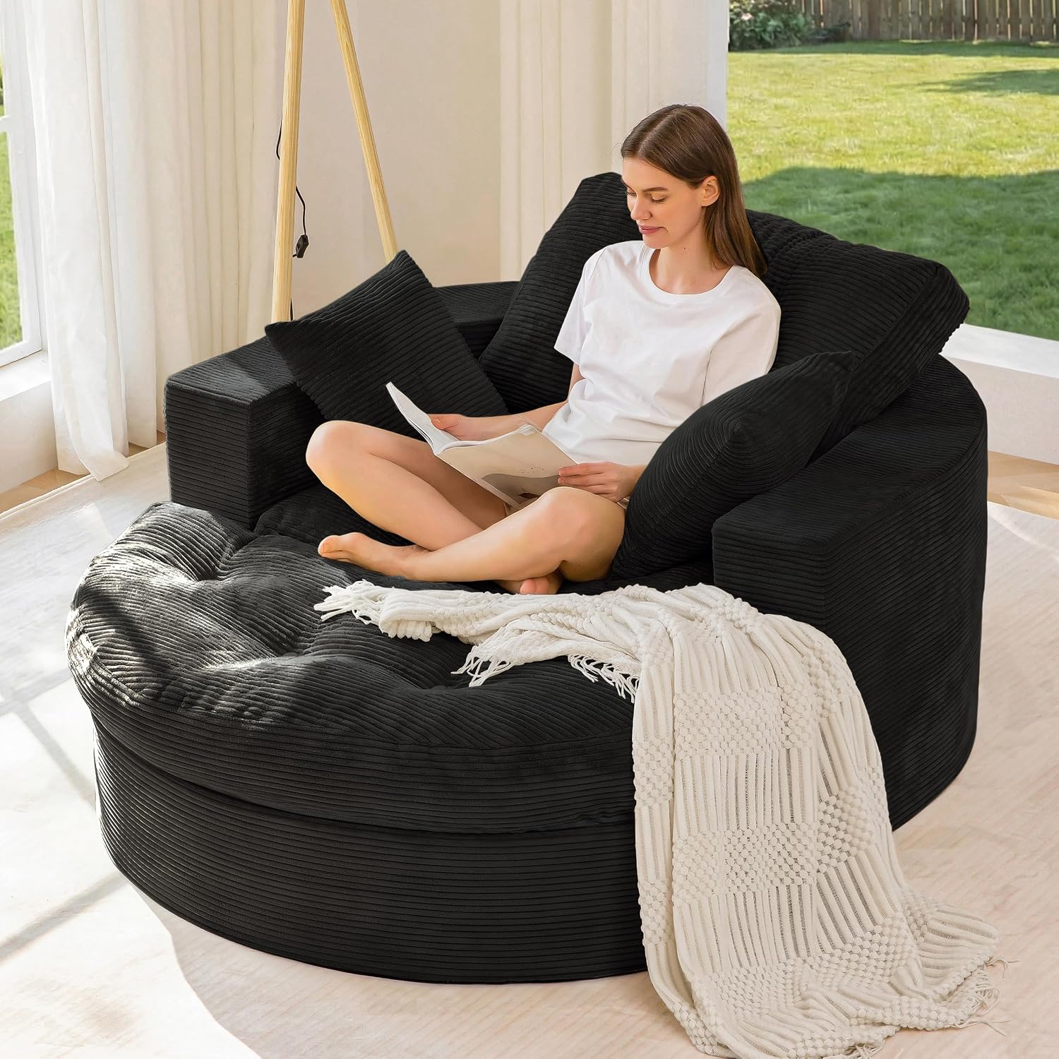 This zip‑detachable oversized lounge sofa features dual‑layer foam cushioning, soft textured fabric and needs no assembly for flexible home seating.