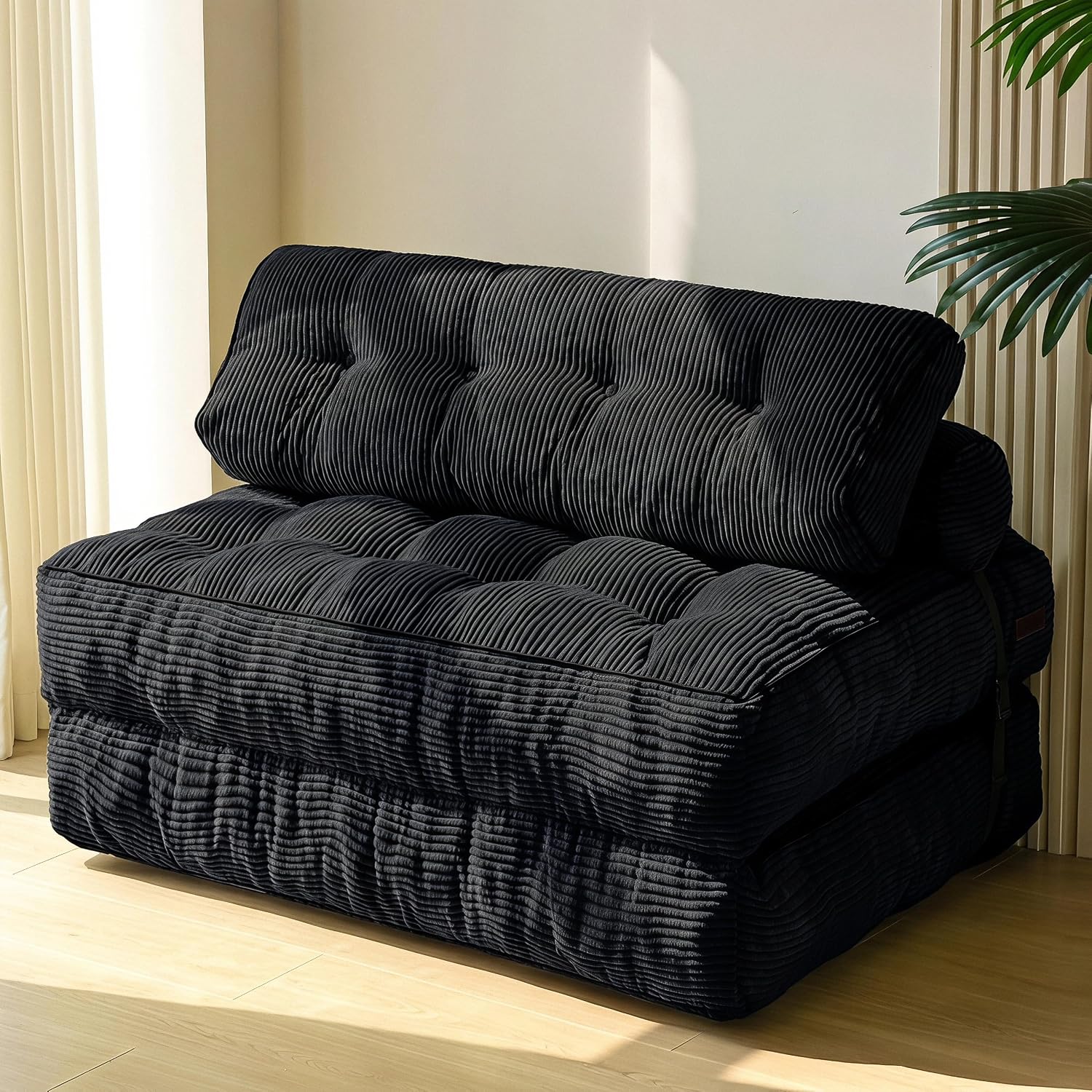 Practical folding sofa‑bed with headrest and lumbar support, comfy foam filling, compact multi‑use furniture for small living spaces and overnight guests.