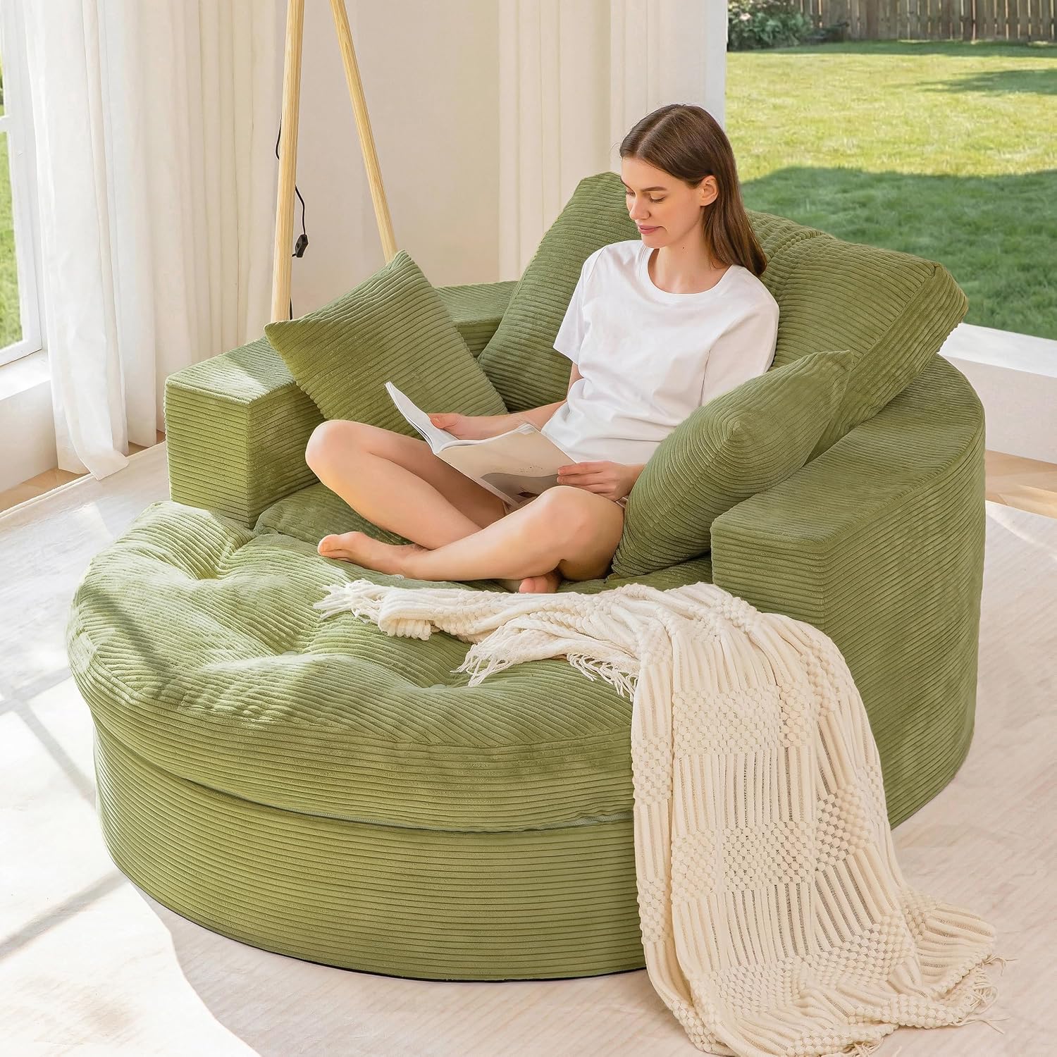 This zip‑detachable oversized lounge sofa features dual‑layer foam cushioning, soft textured fabric and needs no assembly for flexible home seating.