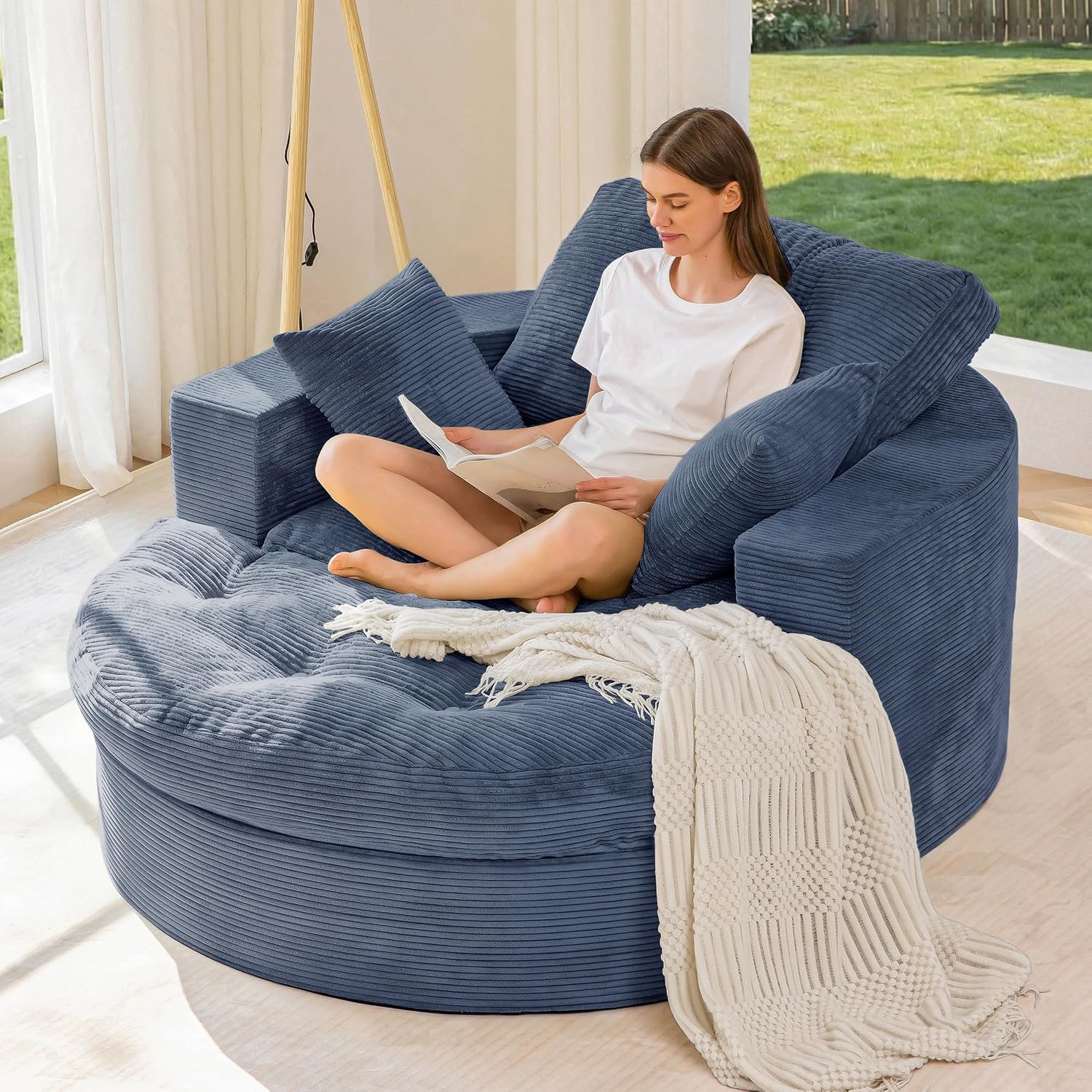 This zip‑detachable oversized lounge sofa features dual‑layer foam cushioning, soft textured fabric and needs no assembly for flexible home seating.