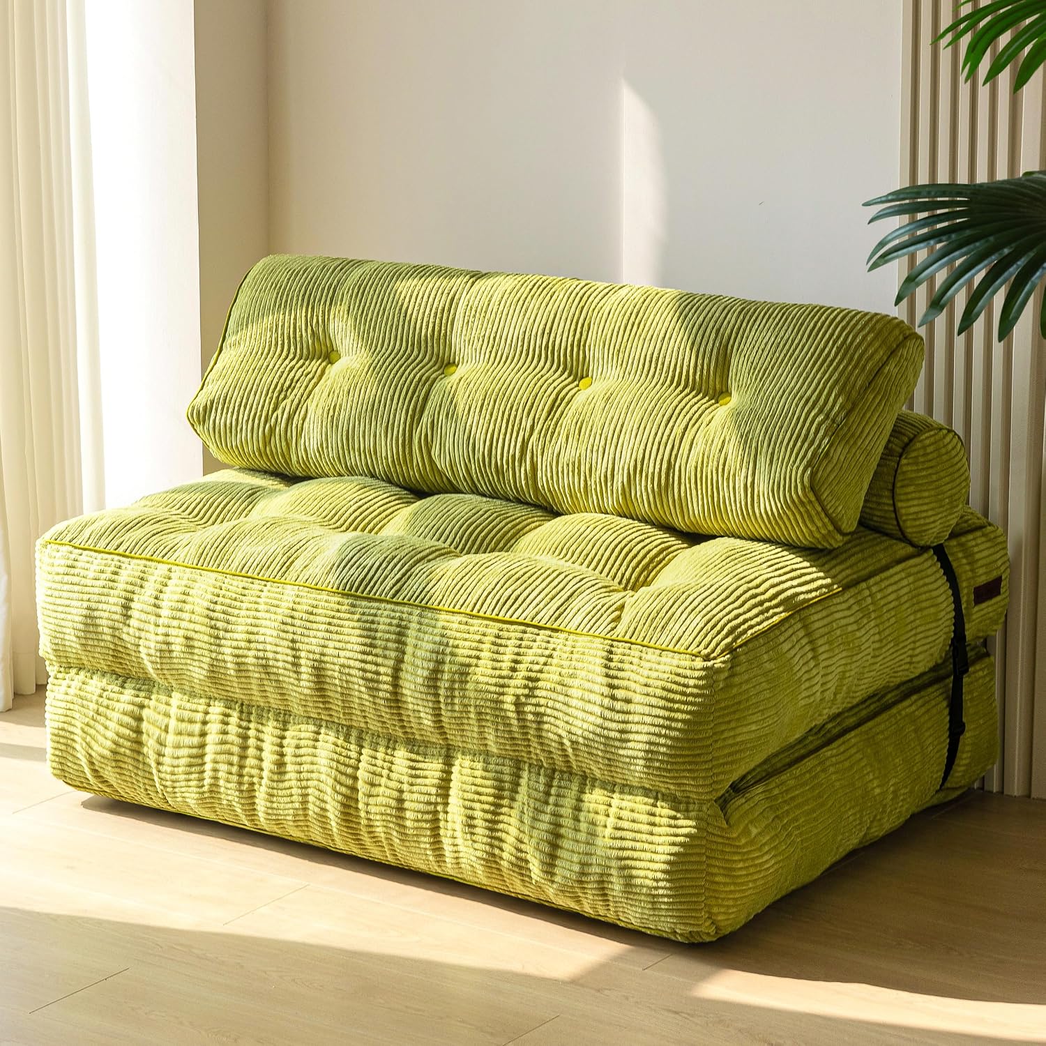 Practical folding sofa‑bed with headrest and lumbar support, comfy foam filling, compact multi‑use furniture for small living spaces and overnight guests.