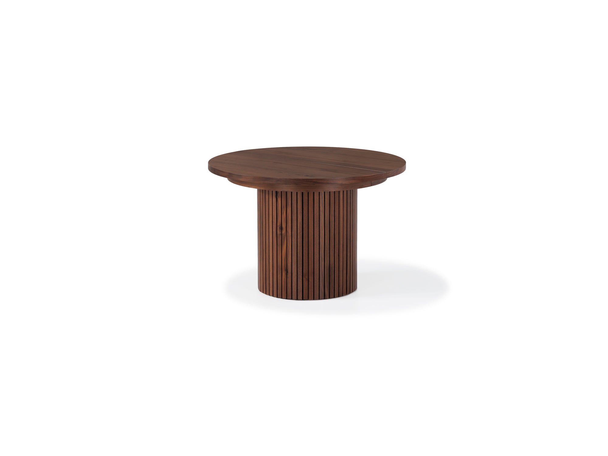 Versatile expandable dining table seats 4‑10, robust hardwood‑steel build, hidden pedestal storage and elegant fluted detailing for flexible everyday dining.