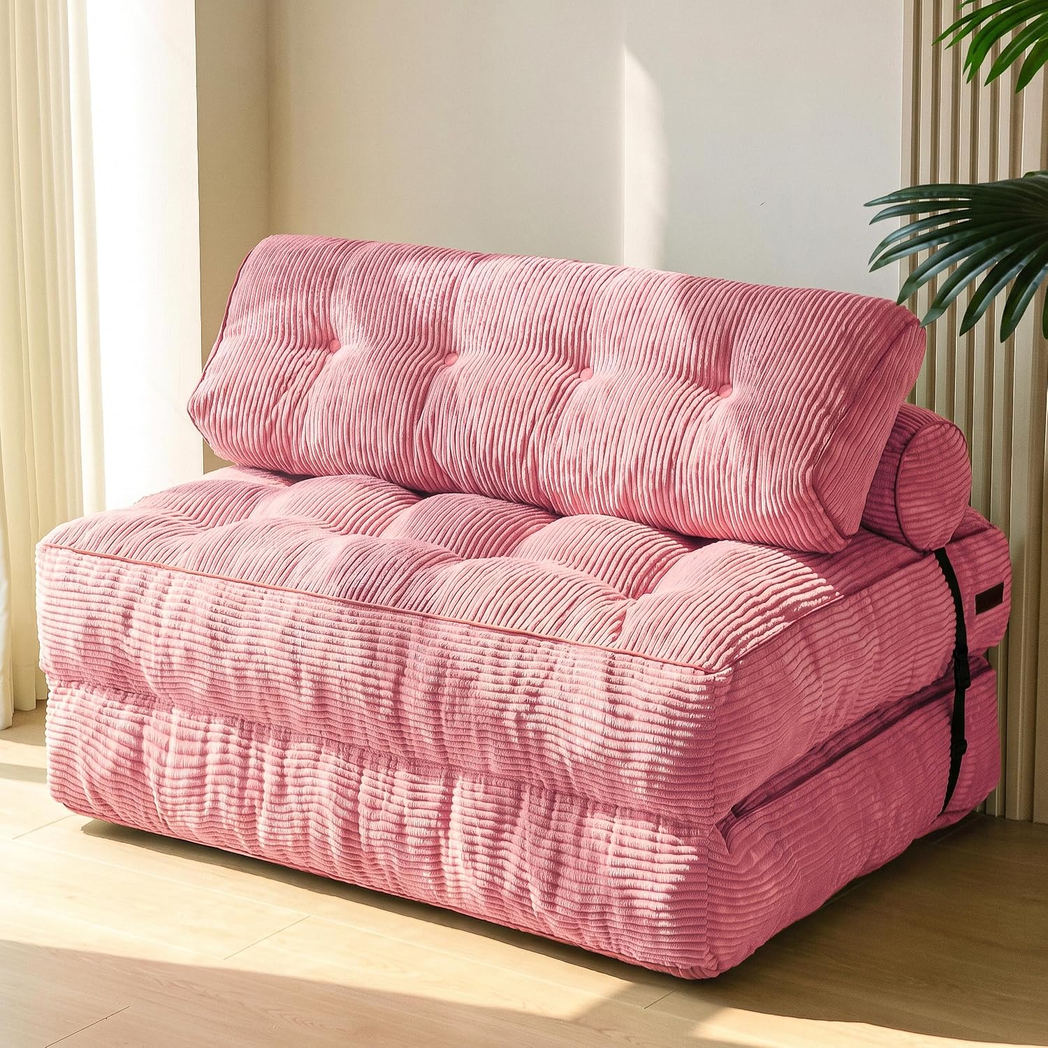 Practical folding sofa‑bed with headrest and lumbar support, comfy foam filling, compact multi‑use furniture for small living spaces and overnight guests.