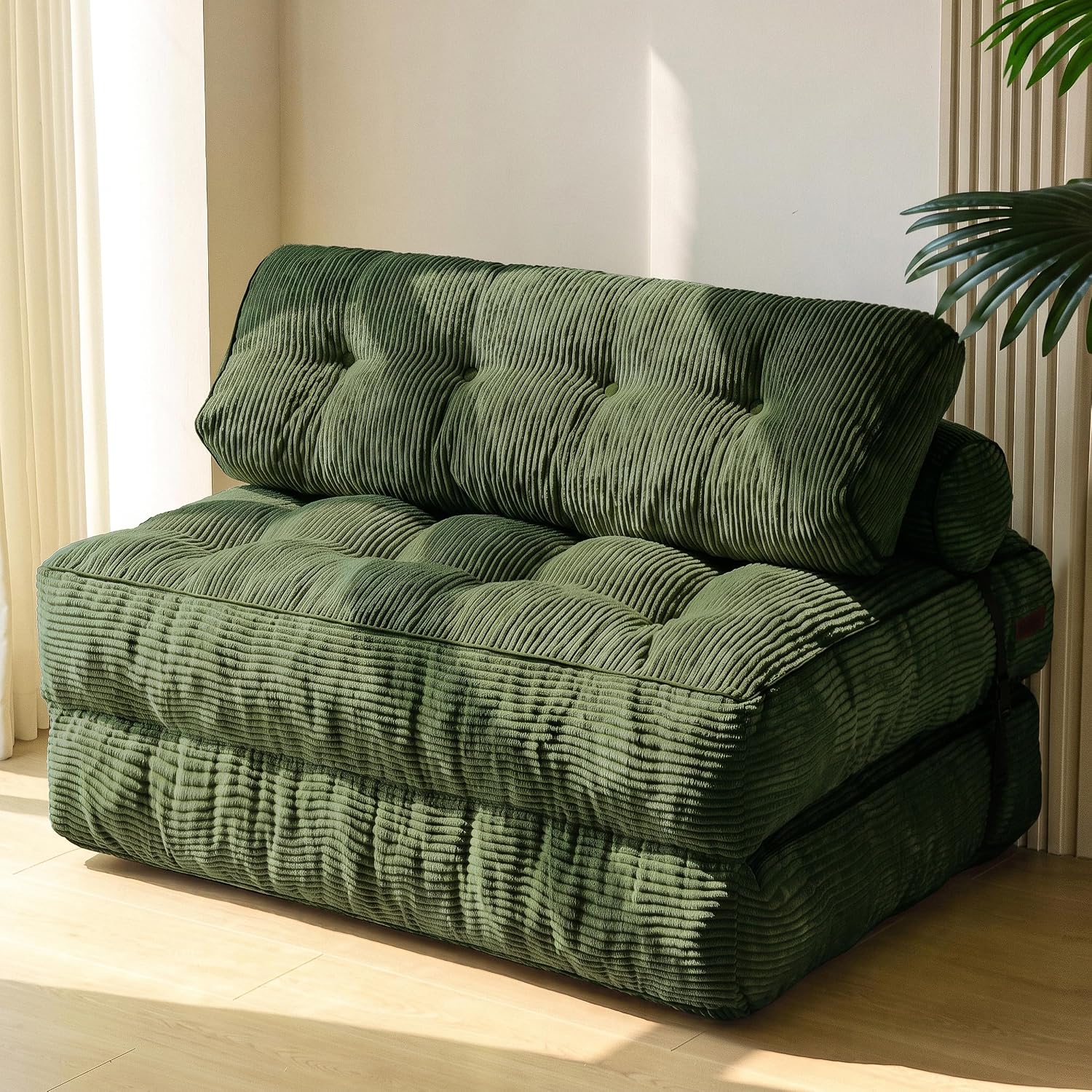 Practical folding sofa‑bed with headrest and lumbar support, comfy foam filling, compact multi‑use furniture for small living spaces and overnight guests.