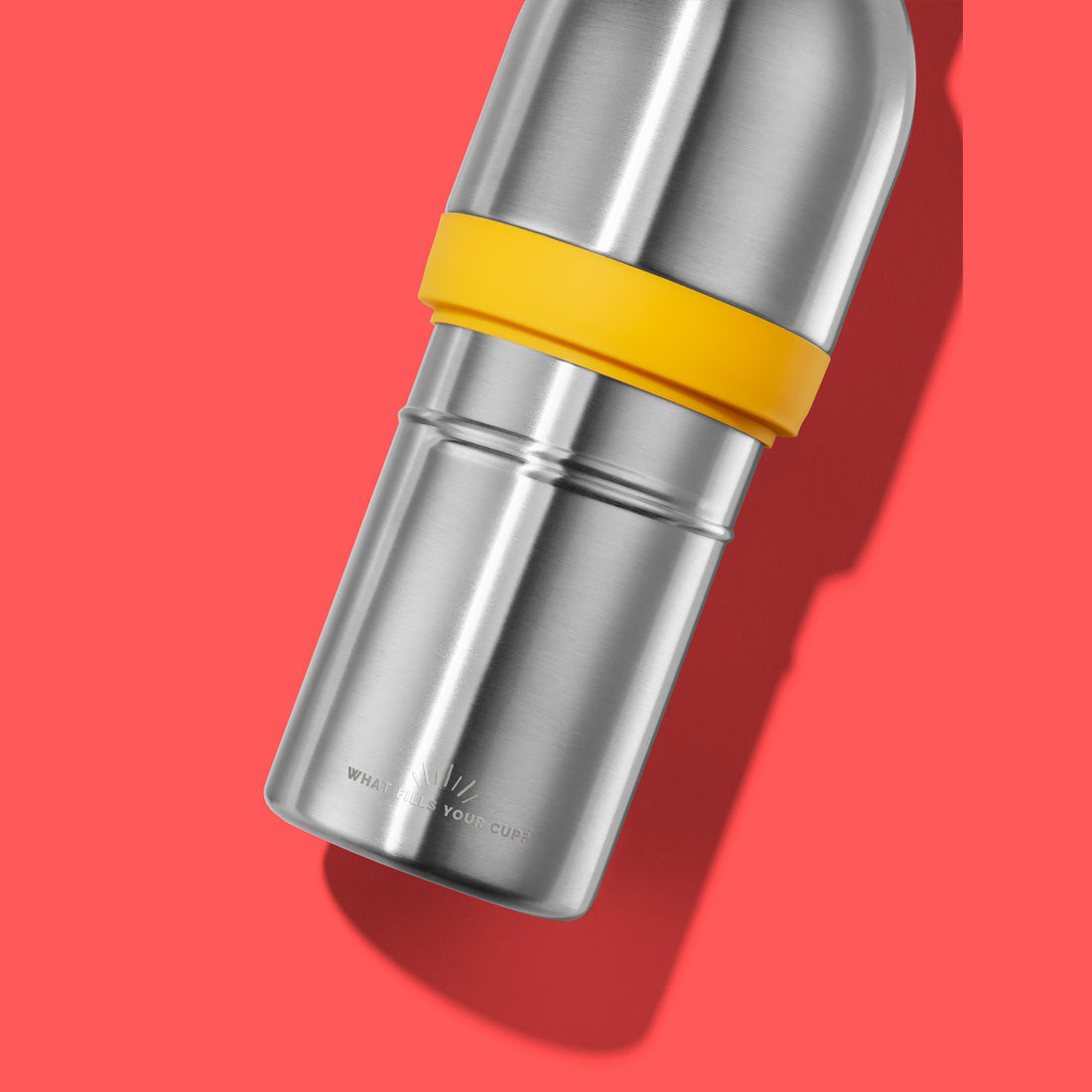 2‑in‑1 reusable insulated water bottle & coffee cup with hidden stored lid, modular build, keeps drinks hot or cold for travel and on‑the‑go use. 