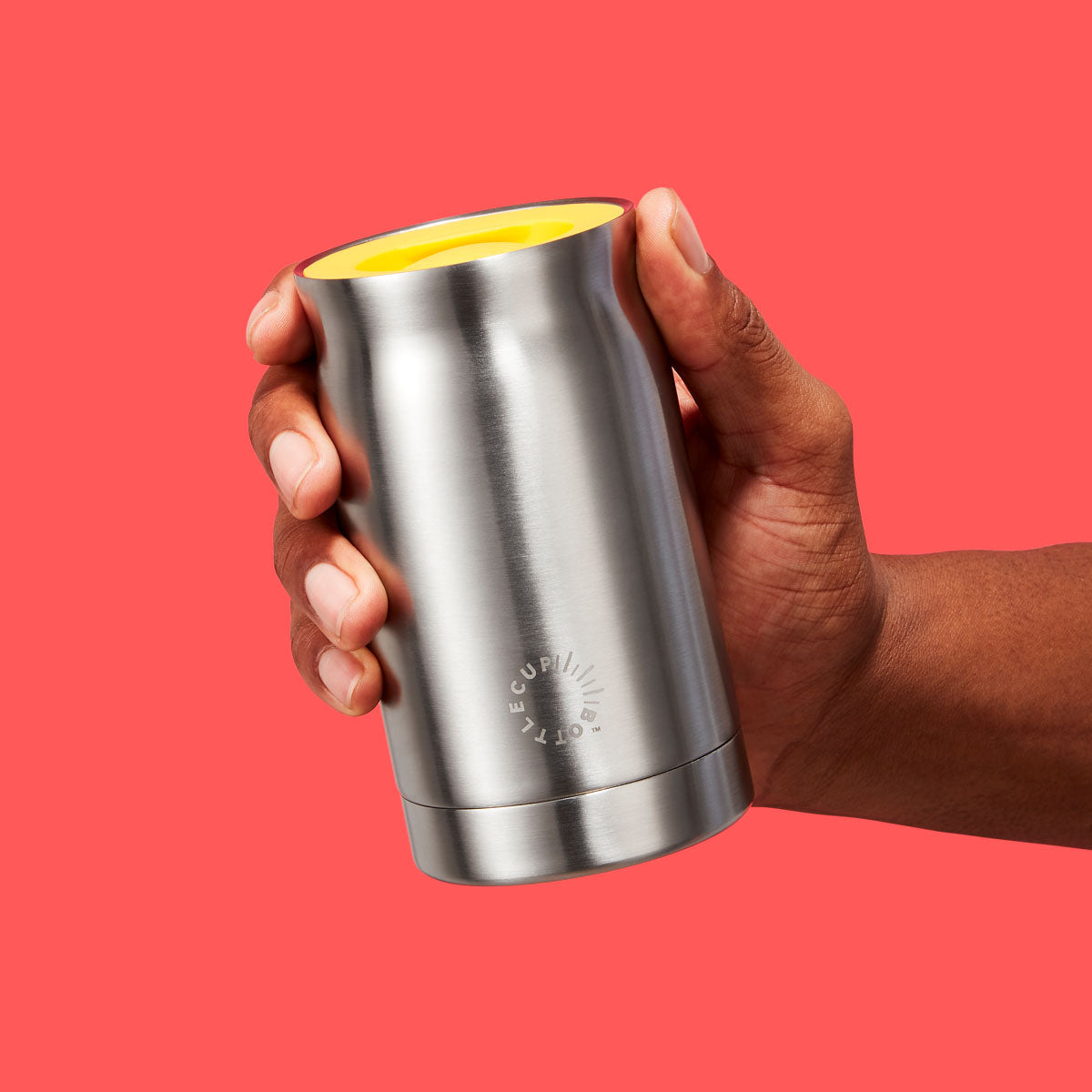 2‑in‑1 reusable insulated water bottle & coffee cup with hidden stored lid, modular build, keeps drinks hot or cold for travel and on‑the‑go use. 