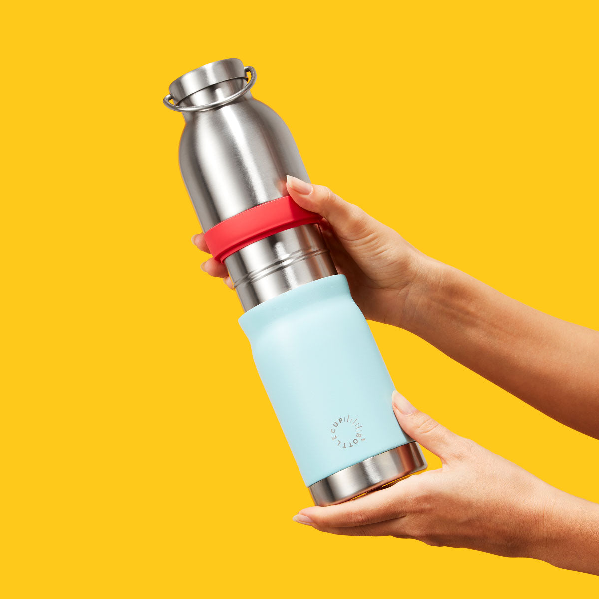 2‑in‑1 reusable insulated water bottle & coffee cup with hidden stored lid, modular build, keeps drinks hot or cold for travel and on‑the‑go use. 