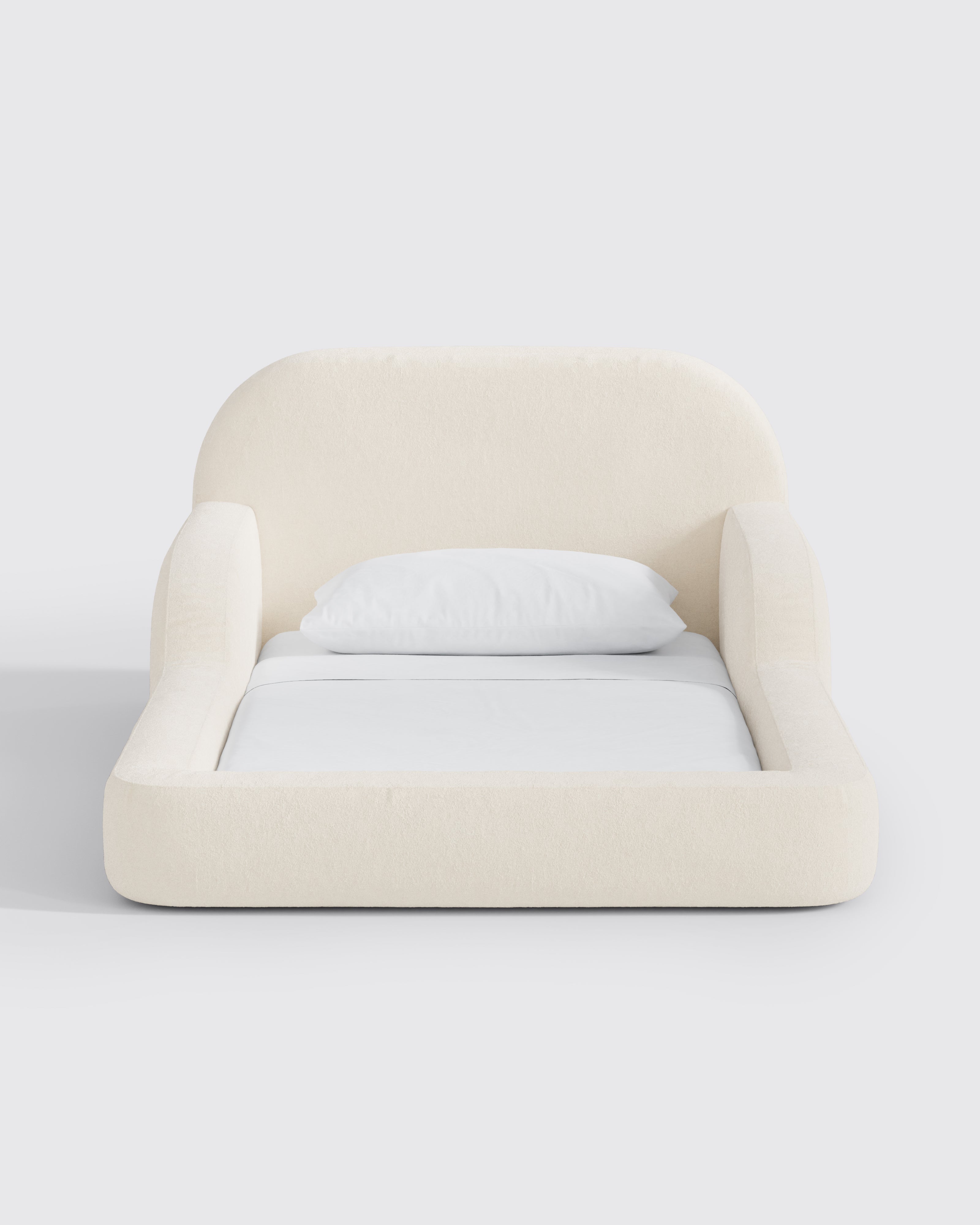 This low‑profile Montessori‑style kids foam bed has soft rounded bump‑safe edges and a removable washable cover for quick, tool‑free setup.