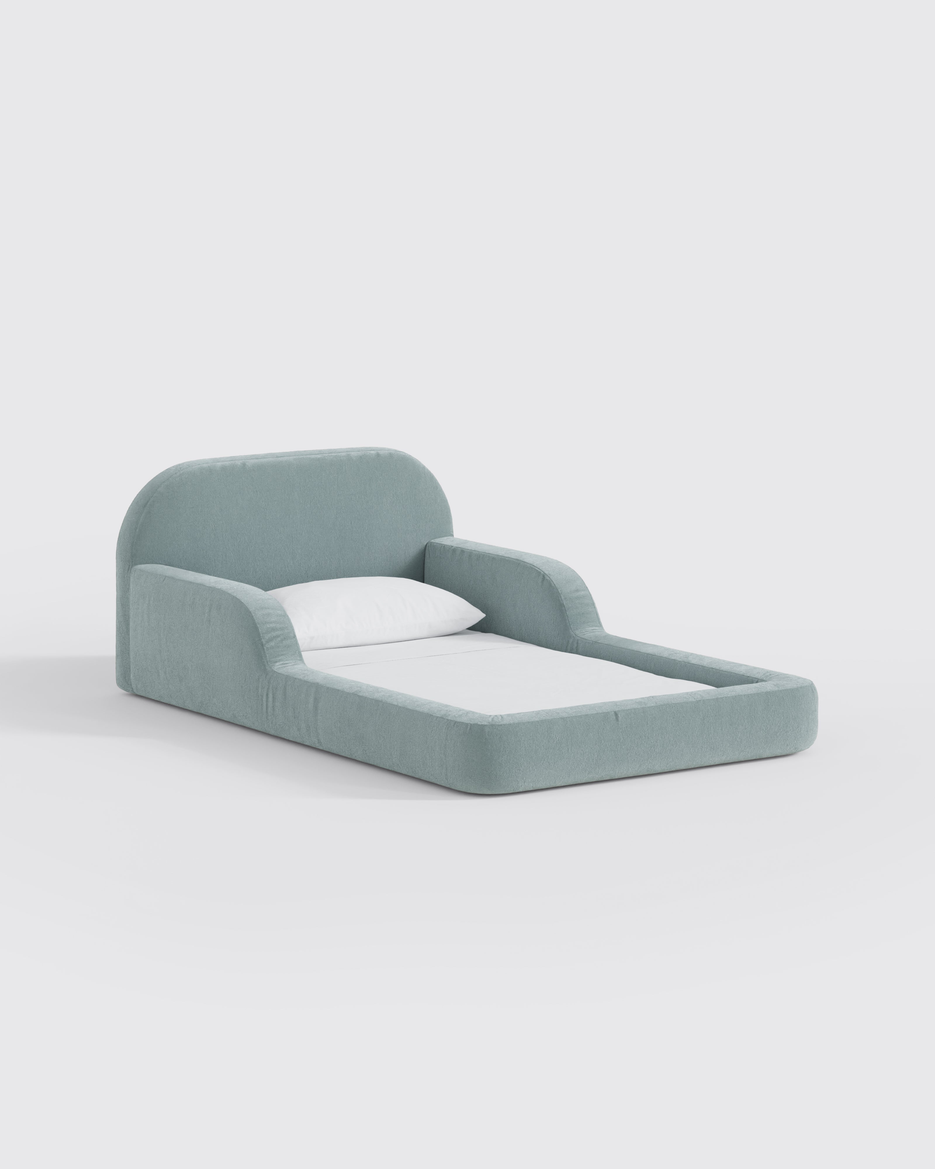 This low‑profile Montessori‑style kids foam bed has soft rounded bump‑safe edges and a removable washable cover for quick, tool‑free setup.